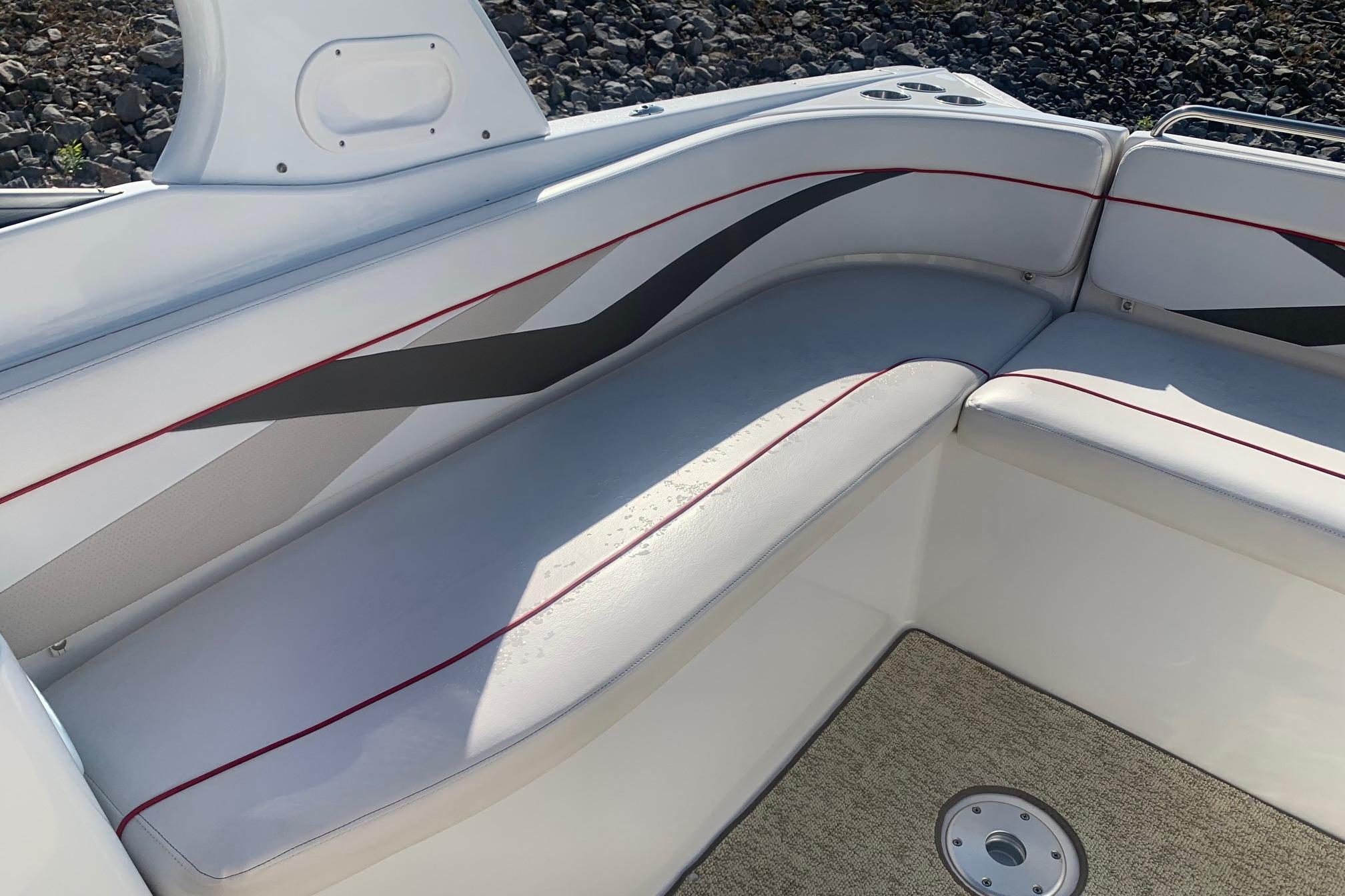 2006 Rinker 282 Captiva Cuddy interior seating with stylish upholstery and modern design.