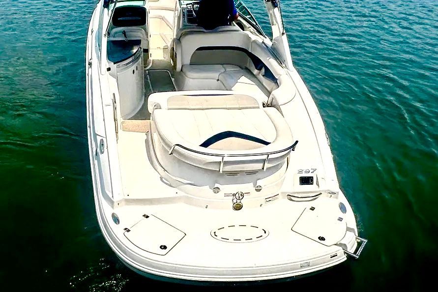 2012 Chaparral 287 SSX boat on calm water.