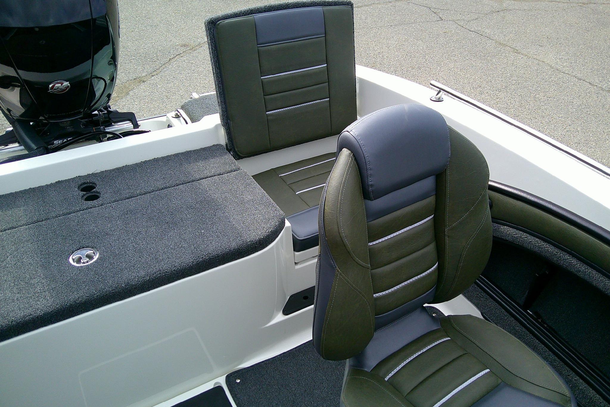 2026 Ranger 1880MS boat interior with cushioned seating and motor detail.