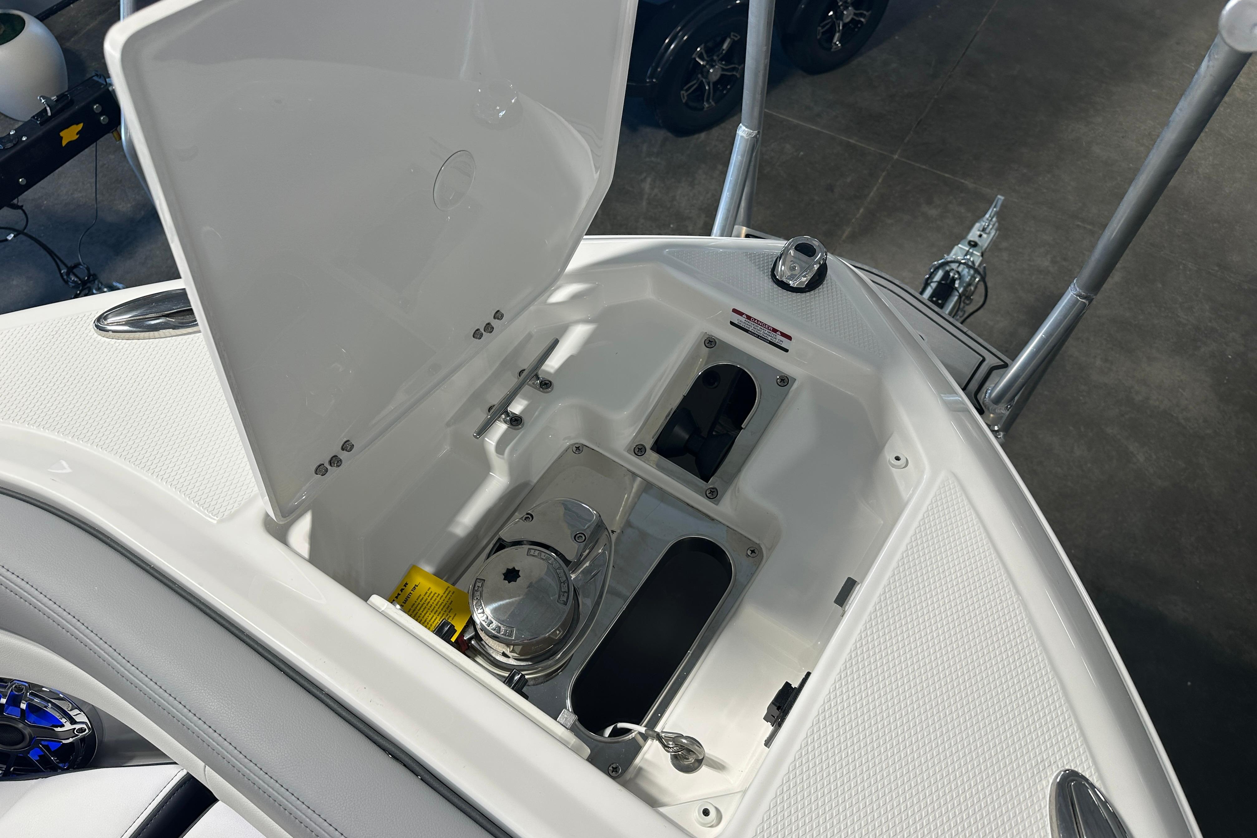 Chaparral SSX 8 2026 anchor compartment with open lid.