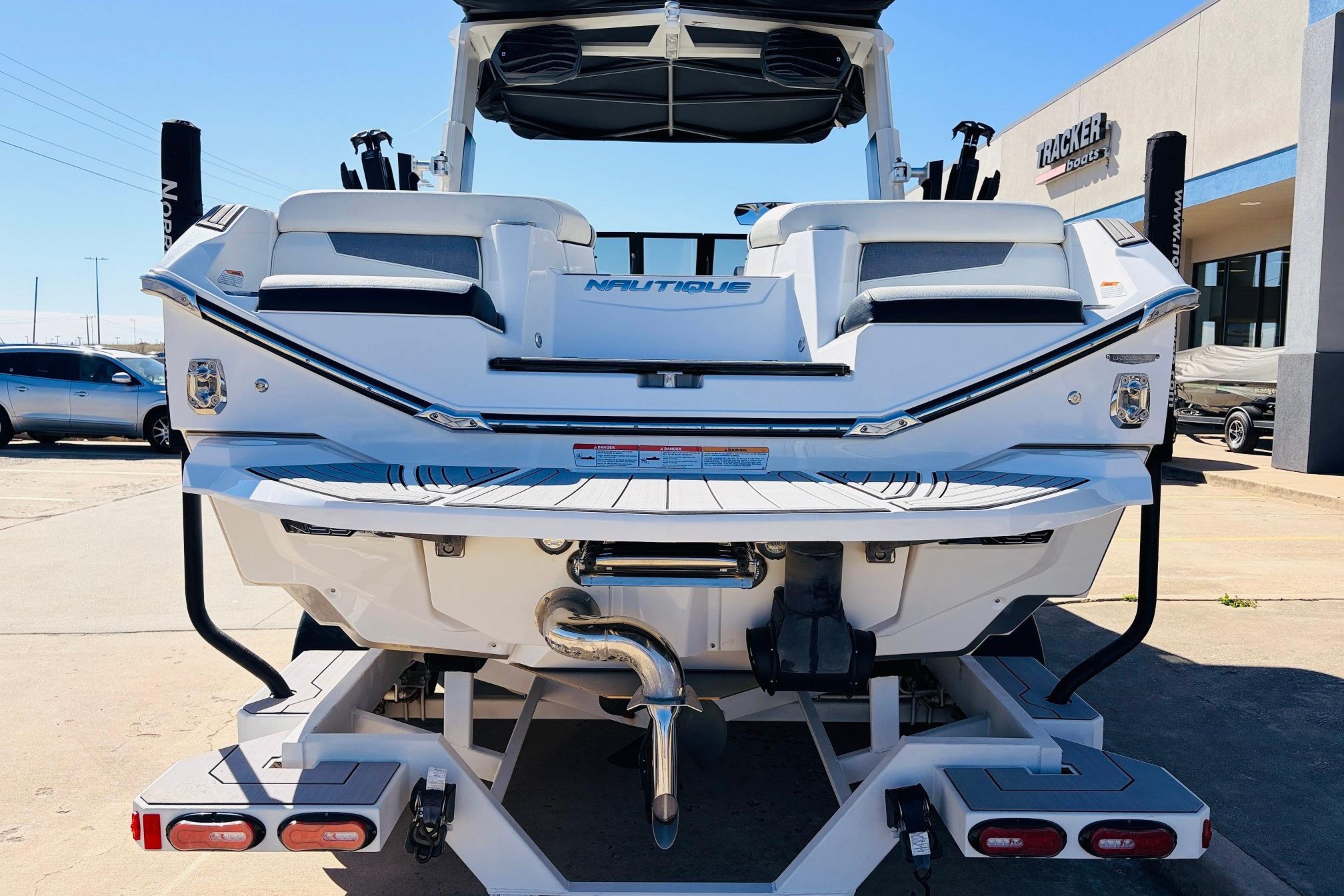 2023 Nautique Super Air Nautique G25 boat rear view at dealership.
