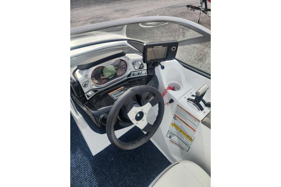 2012 Sea-Doo 180 Challenger dashboard with steering wheel and control panel.
