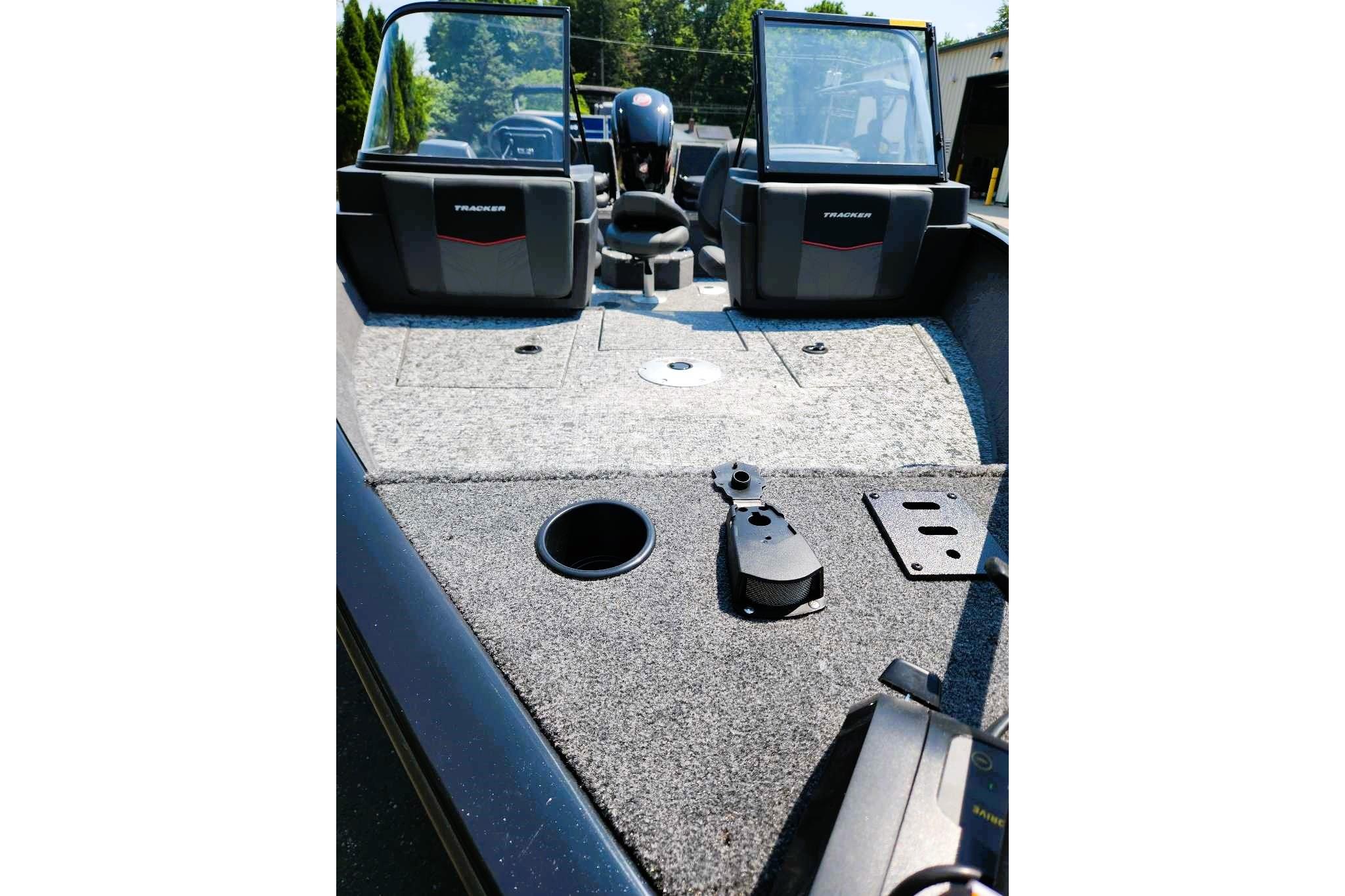 2026 Tracker Pro Guide V-175 Combo boat interior with carpeted deck and seating.