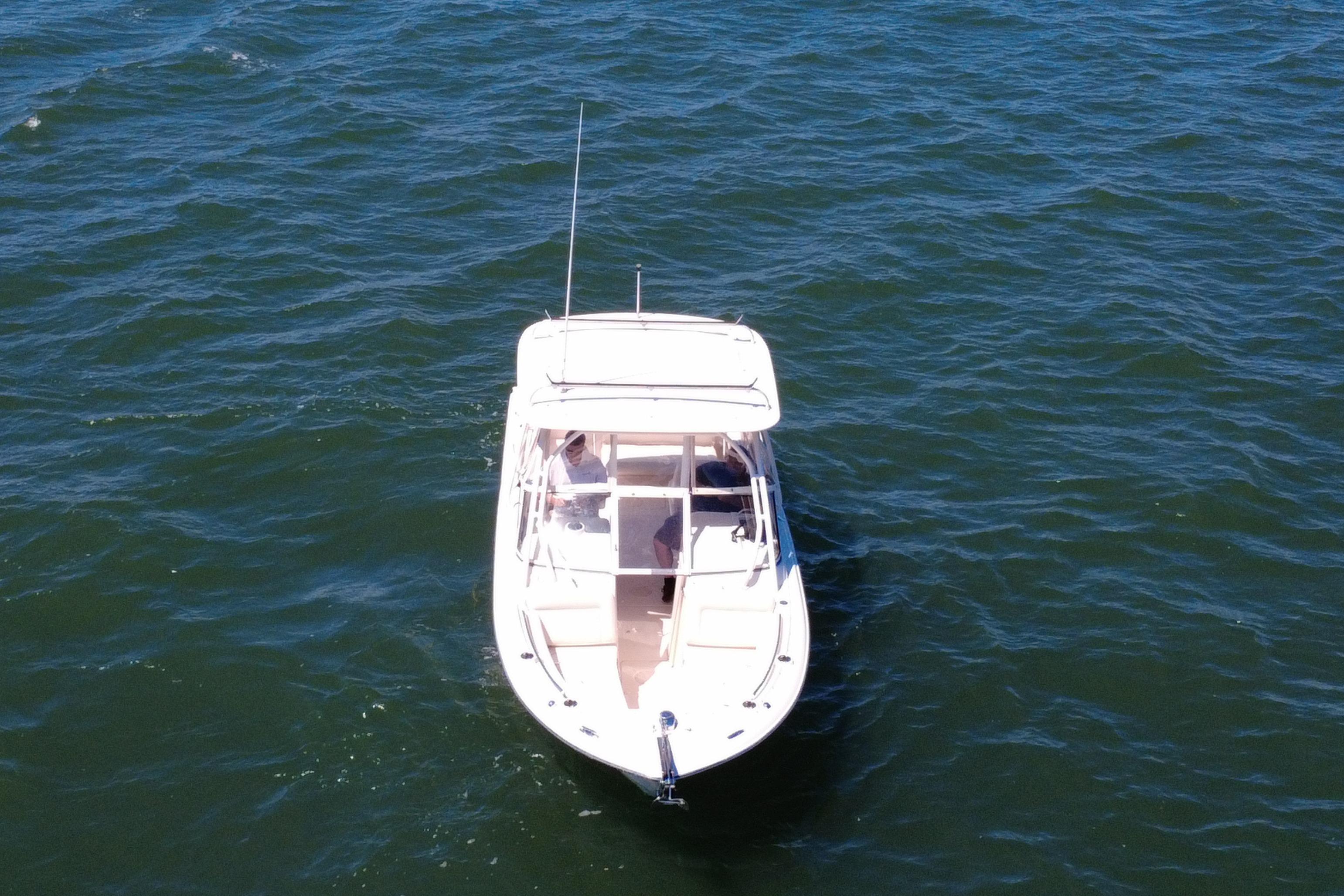 2017 Grady-White Freedom 235 boat on open water, aerial view.