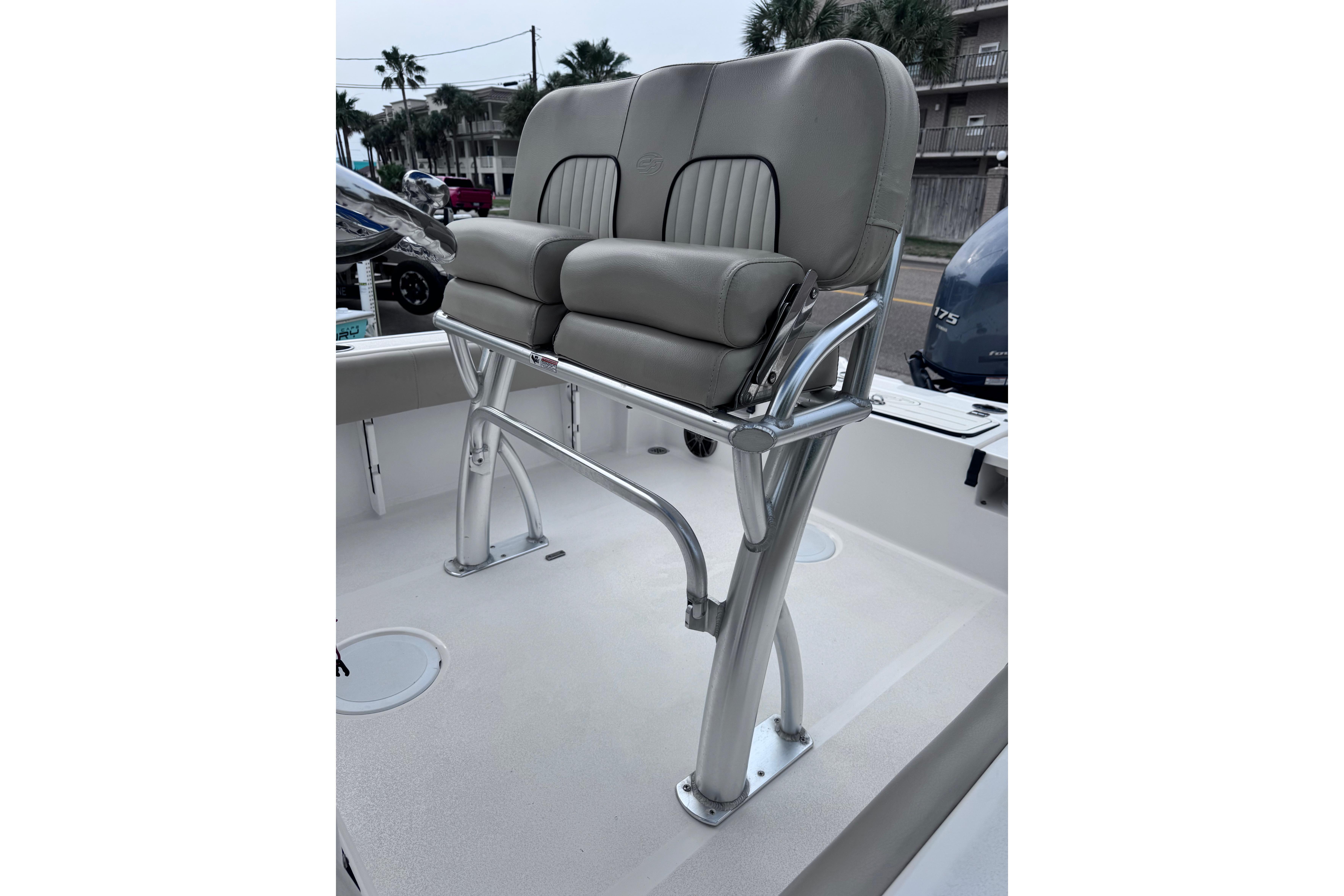 2018 Sea Fox 206 Commander boat with dual cushioned seats and stainless steel frame.
