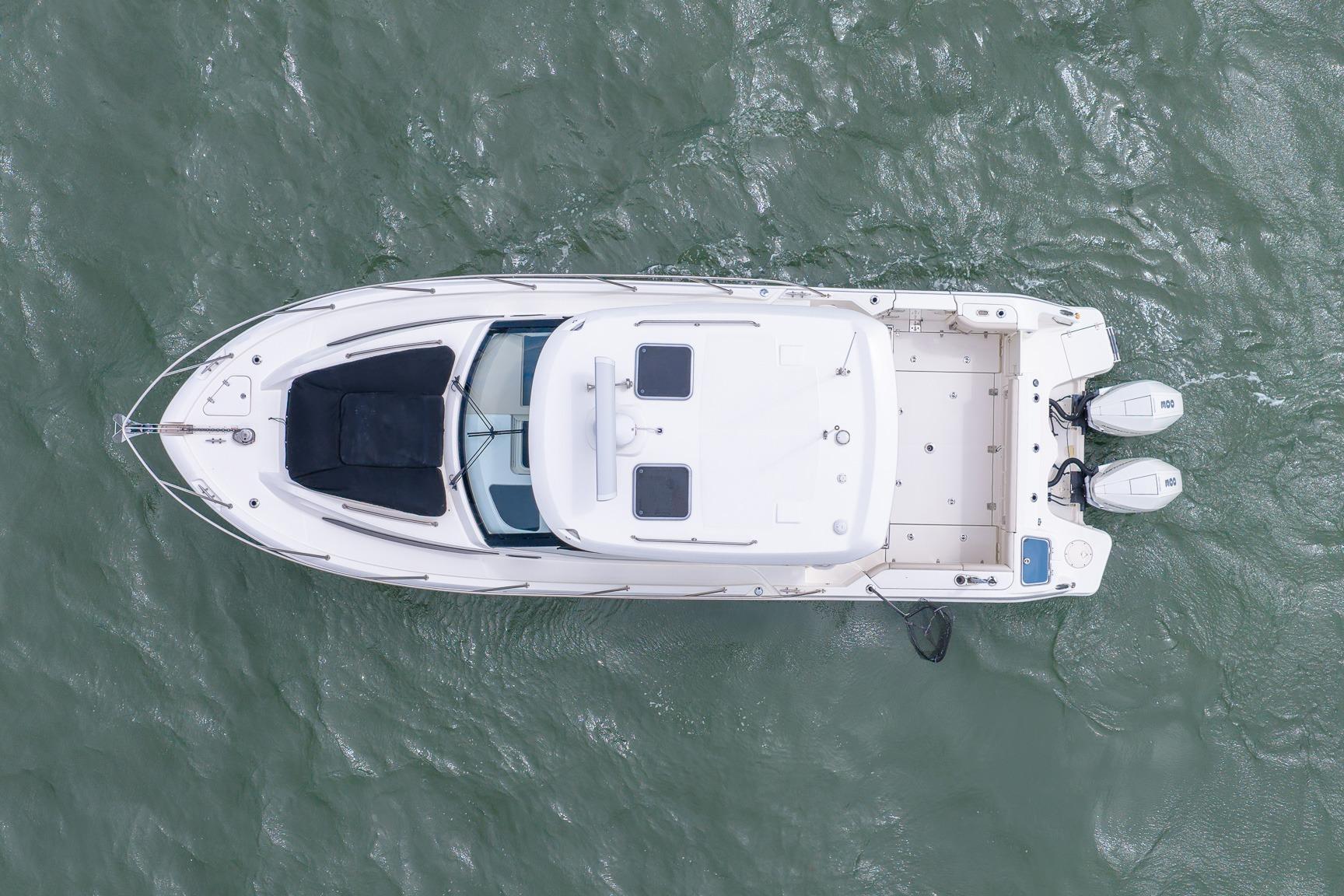 Aerial view of 2020 Boston Whaler 325 Conquest boat on water.