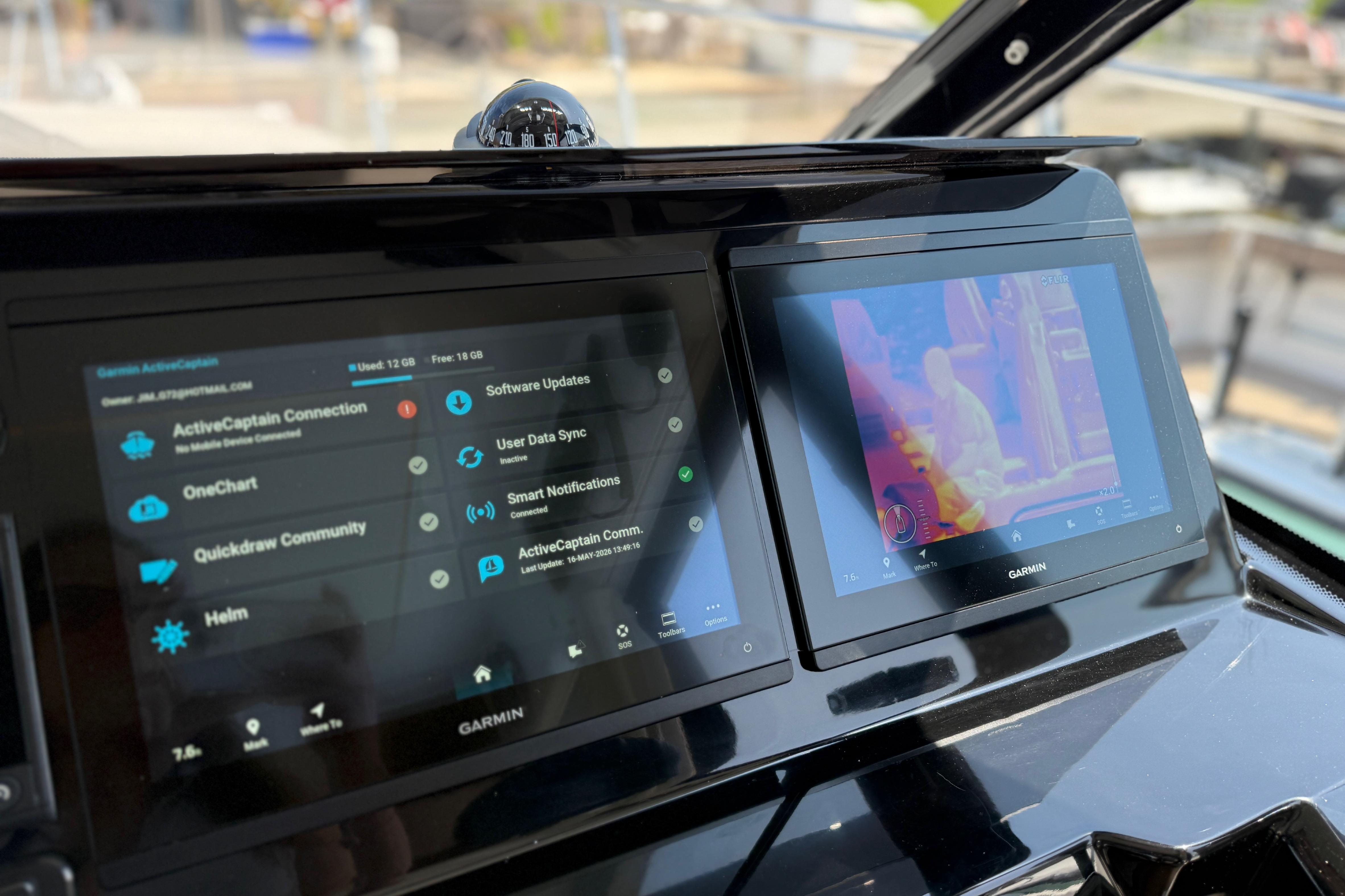 Garmin navigation screens on 2022 Jeanneau NC 1095 Fly boat dashboard.