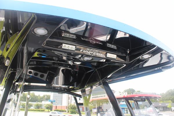 2024 Fountain 34 SC boat interior with sleek black ceiling and integrated lighting.