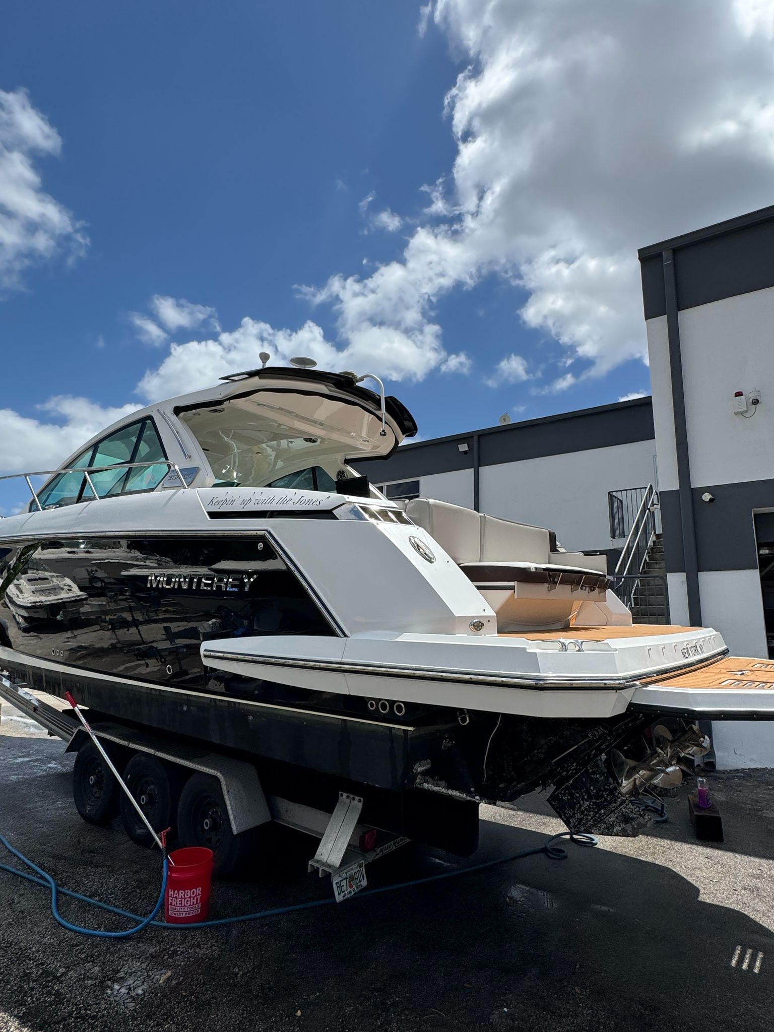 2015 Monterey 360 Sport Coupe on trailer, blue sky.