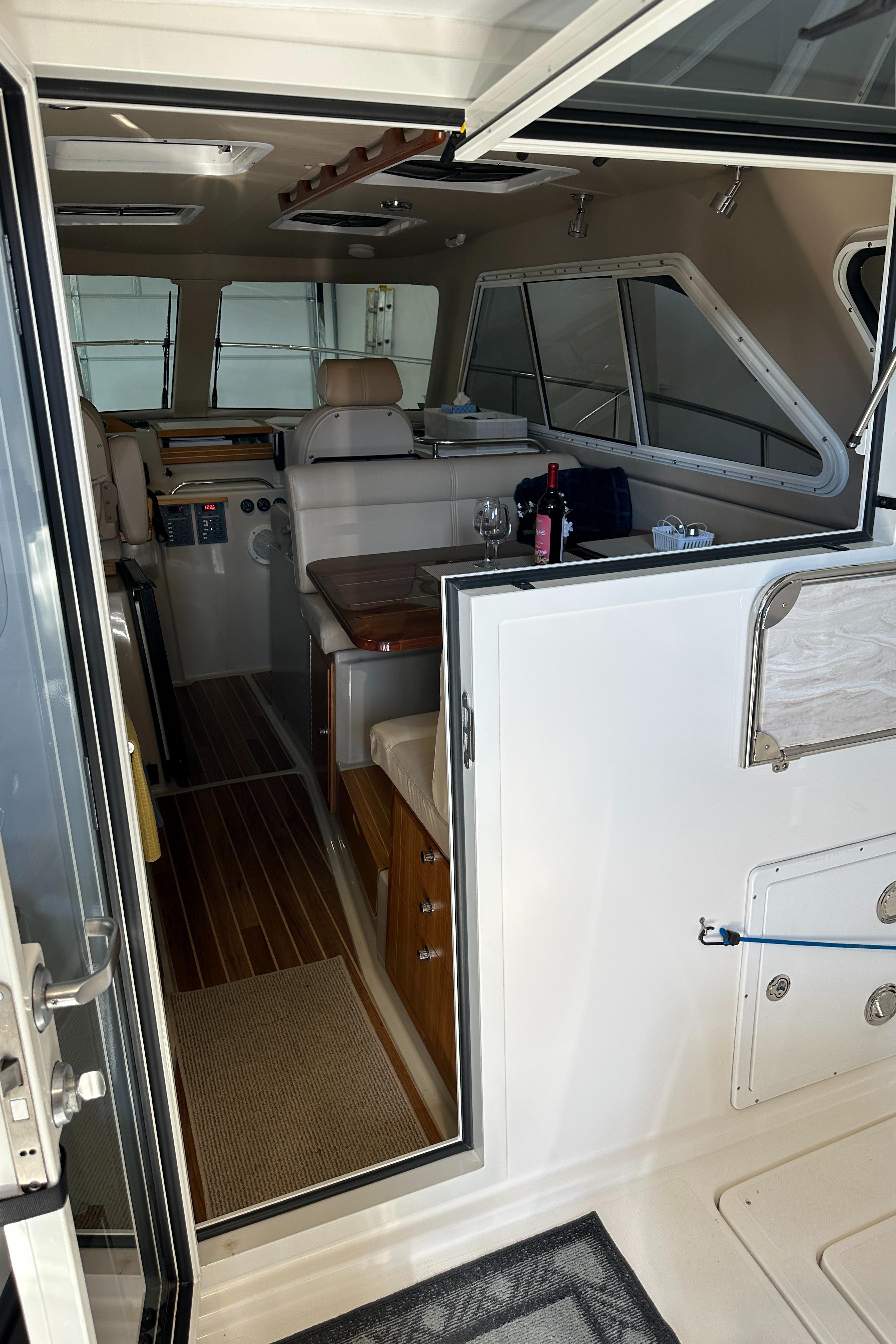 Interior view of a 2016 Aspen C100 yacht with wooden flooring.