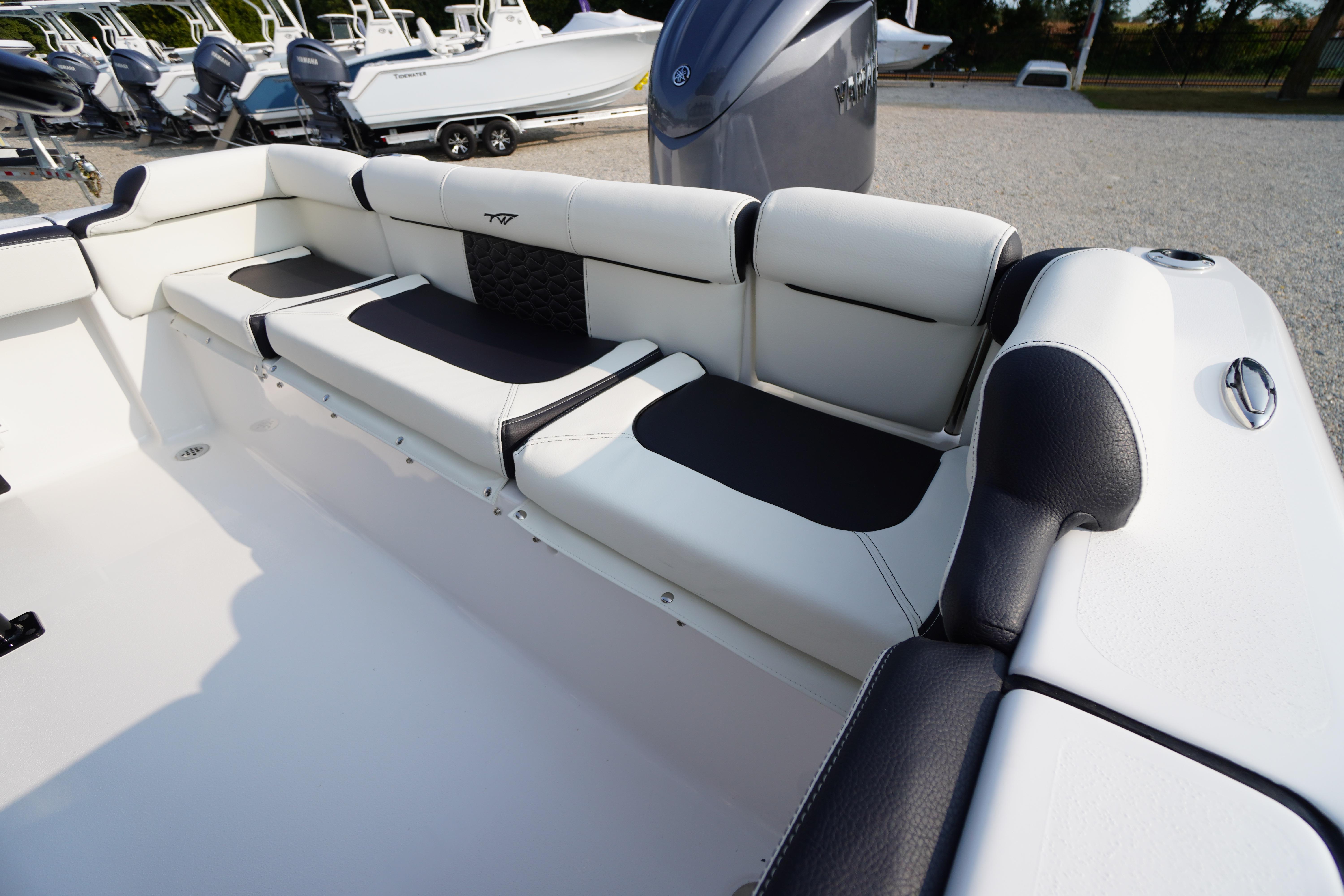 2026 Tidewater 210 LXF boat interior with cushioned seating and modern design.
