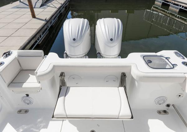 Manufacturer Provided Image: 2026 Sea Hunt Gamefish 28 Coffin Box boat with dual engines at dock.