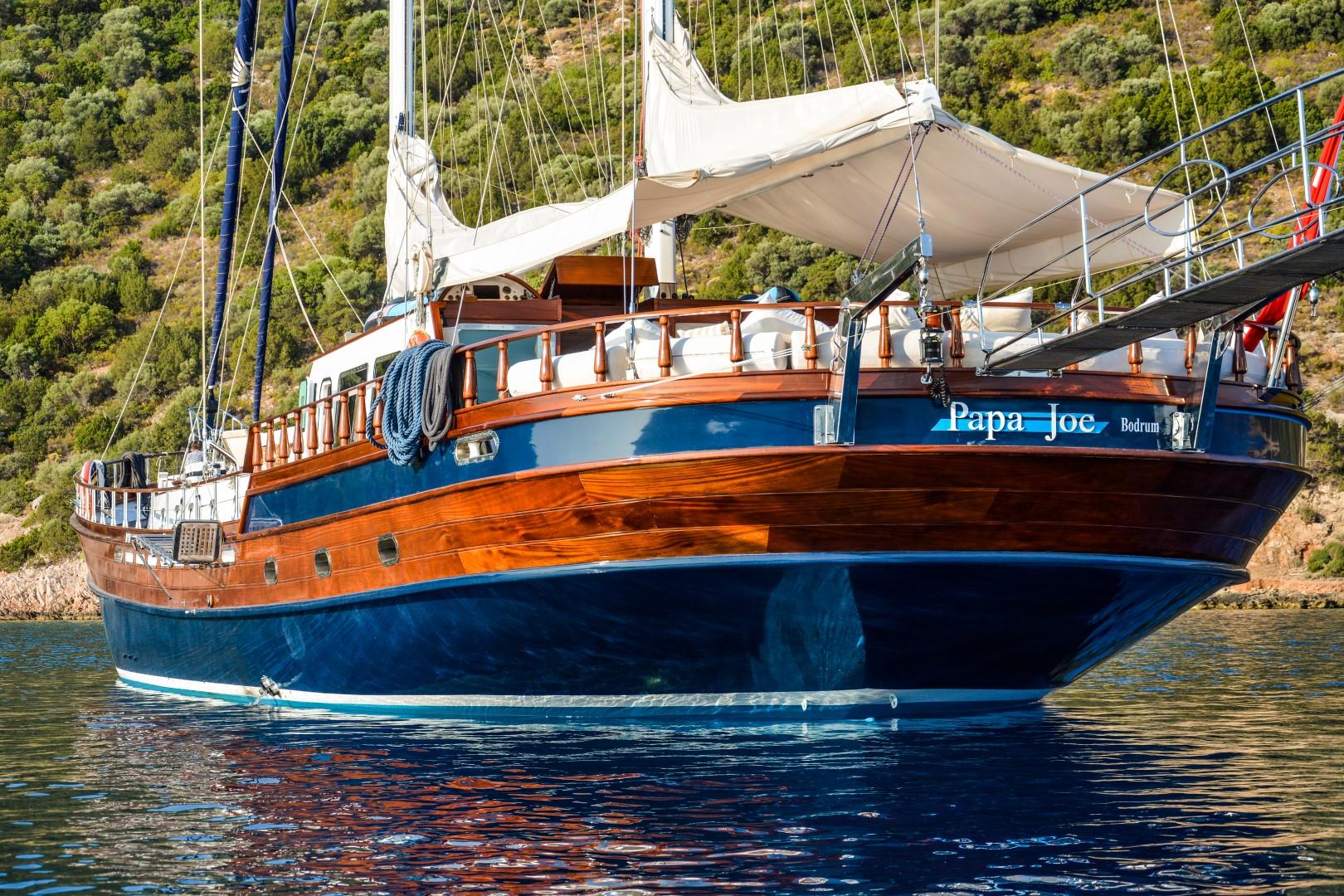 34m Custom Steel Hull Gulet, 2007, anchored in scenic waters.