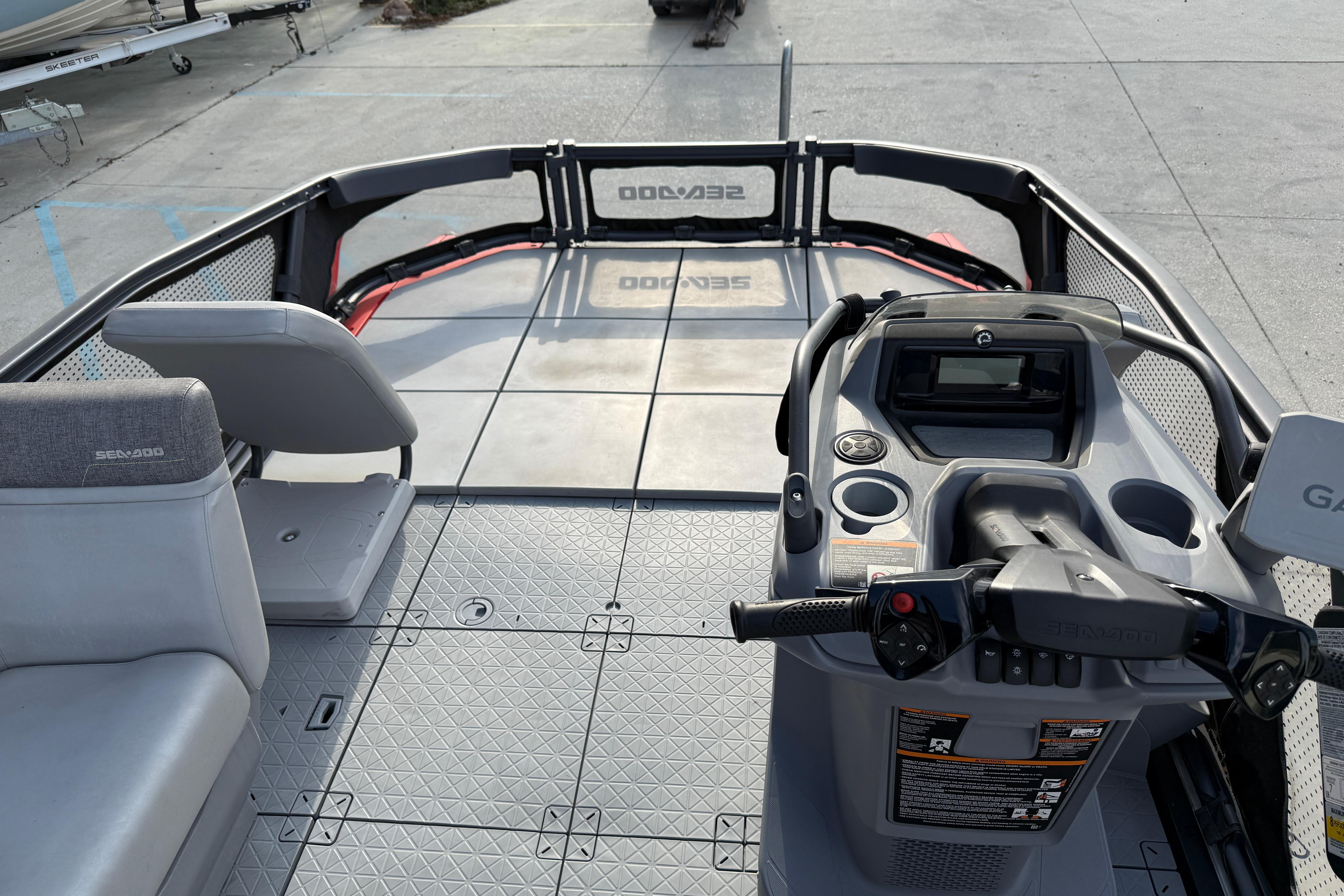 2023 Sea-Doo Switch Sport 18 interior with steering console and seating.