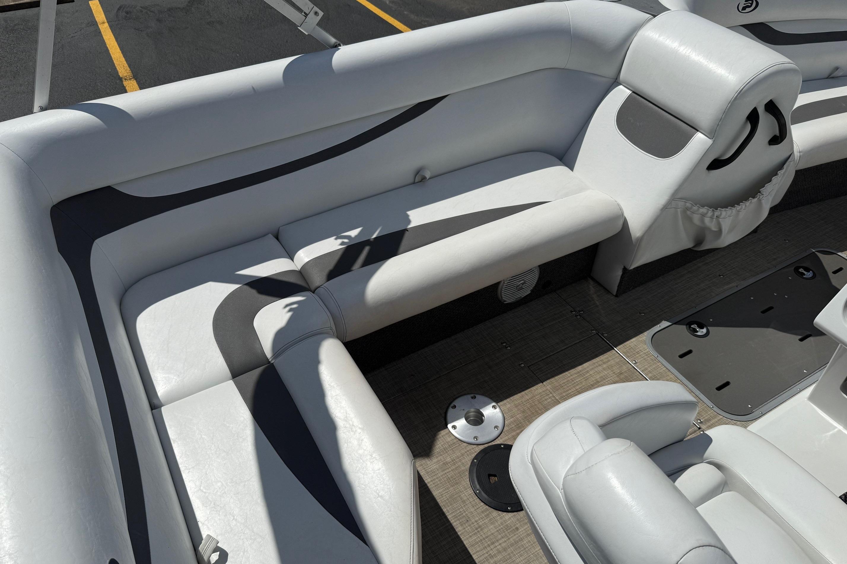 2019 Princecraft Ventura 190 boat interior with white cushioned seating.