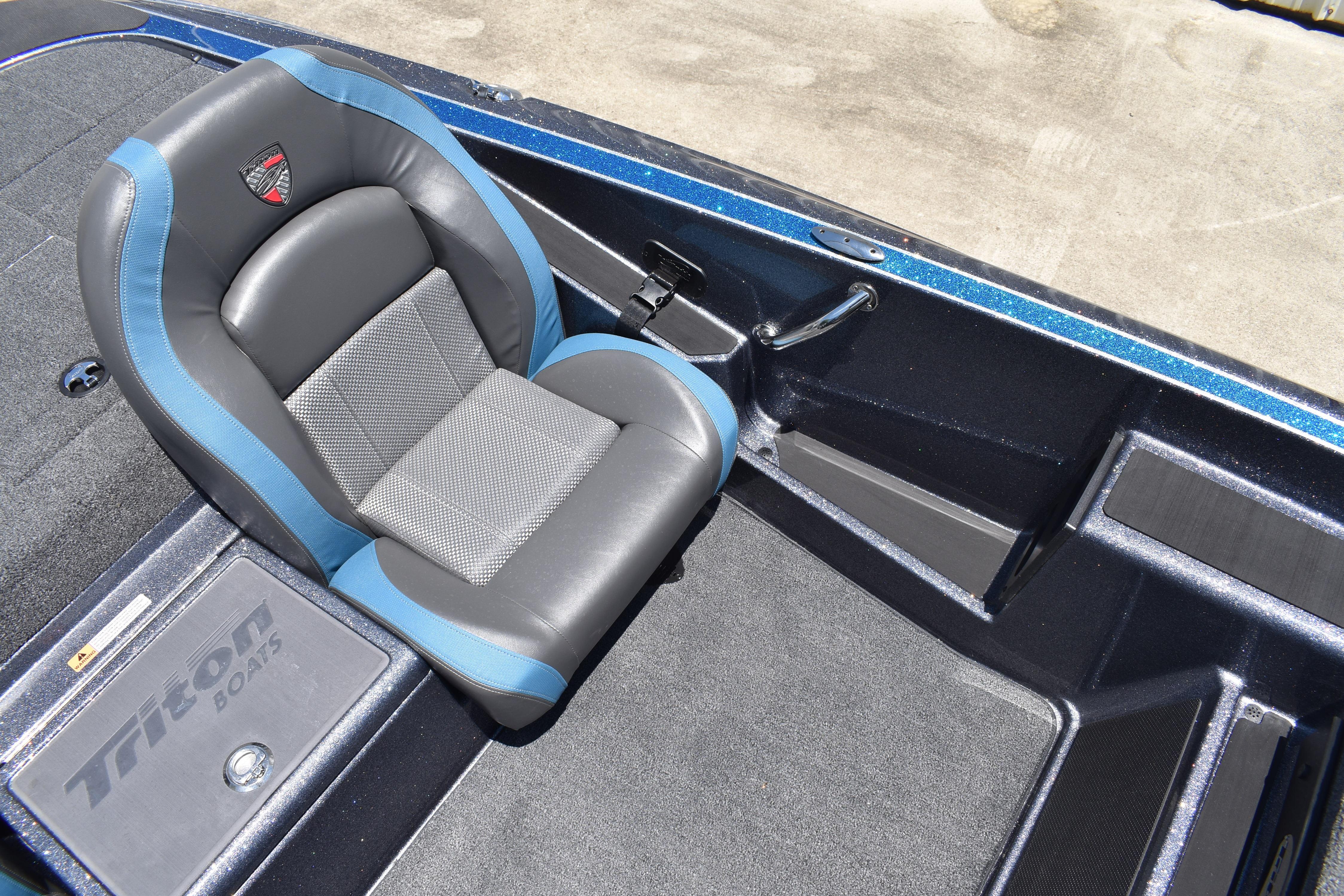 2026 Triton 179 TrX boat interior with blue and gray seating, showcasing premium design.