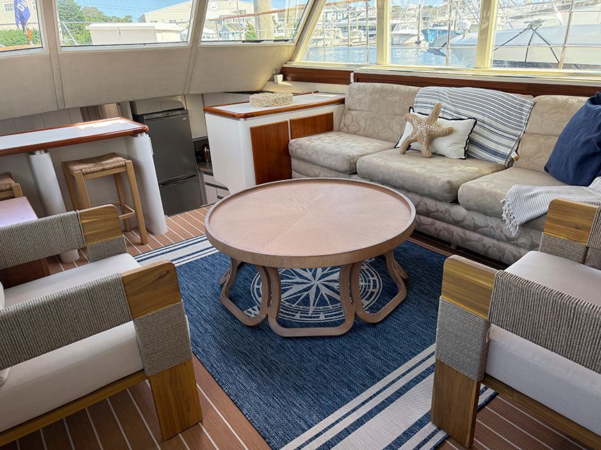 Interior of a 1961 Burger 63 yacht with elegant furnishings and nautical decor.