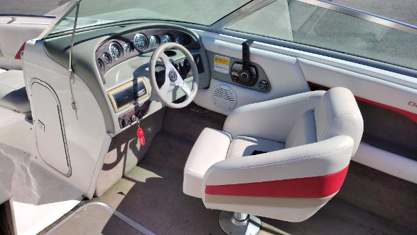 1999 Chaparral 2130 SS boat interior with steering wheel and dashboard.