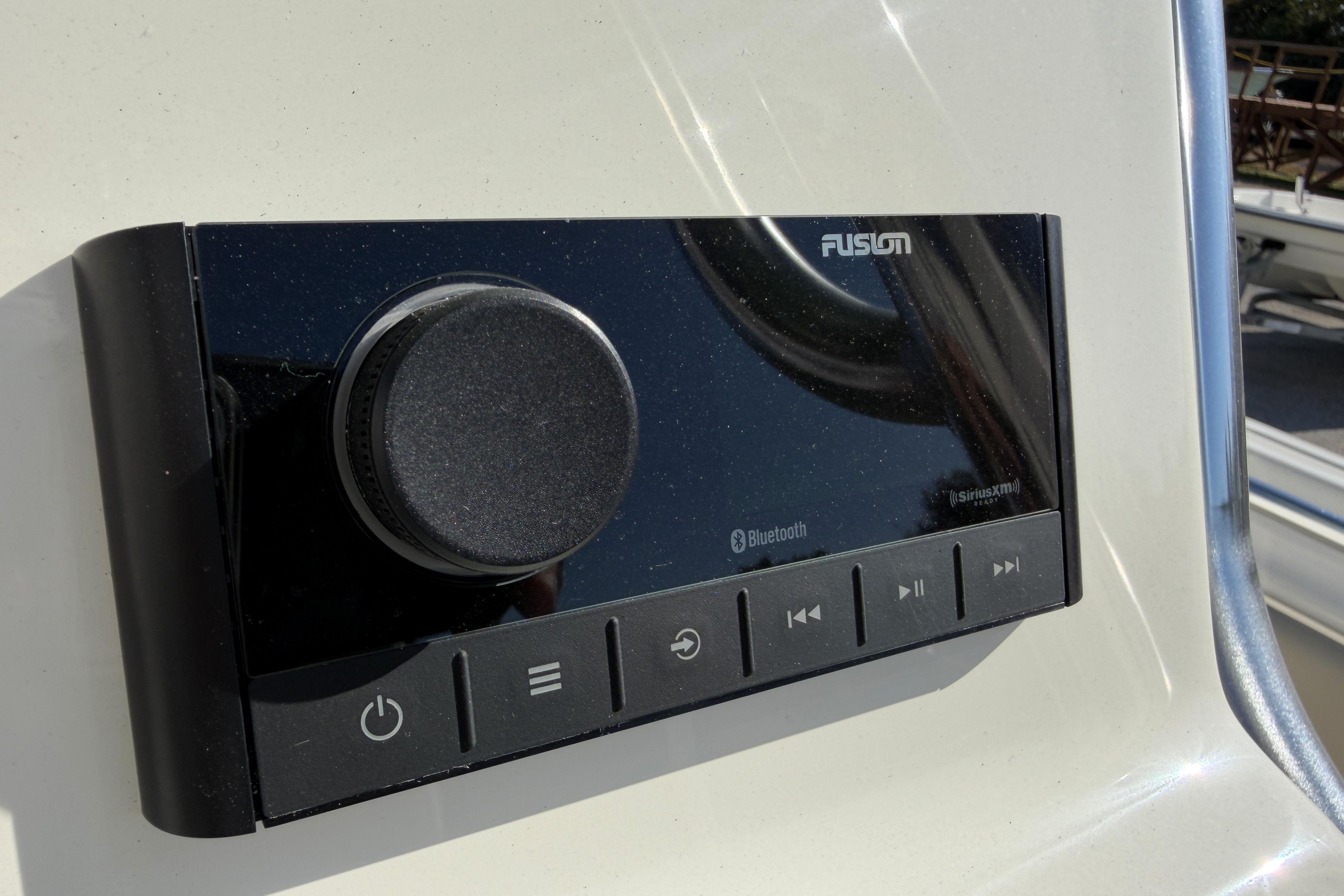 Fusion audio system on 2025 Key West 239 FS boat dashboard.