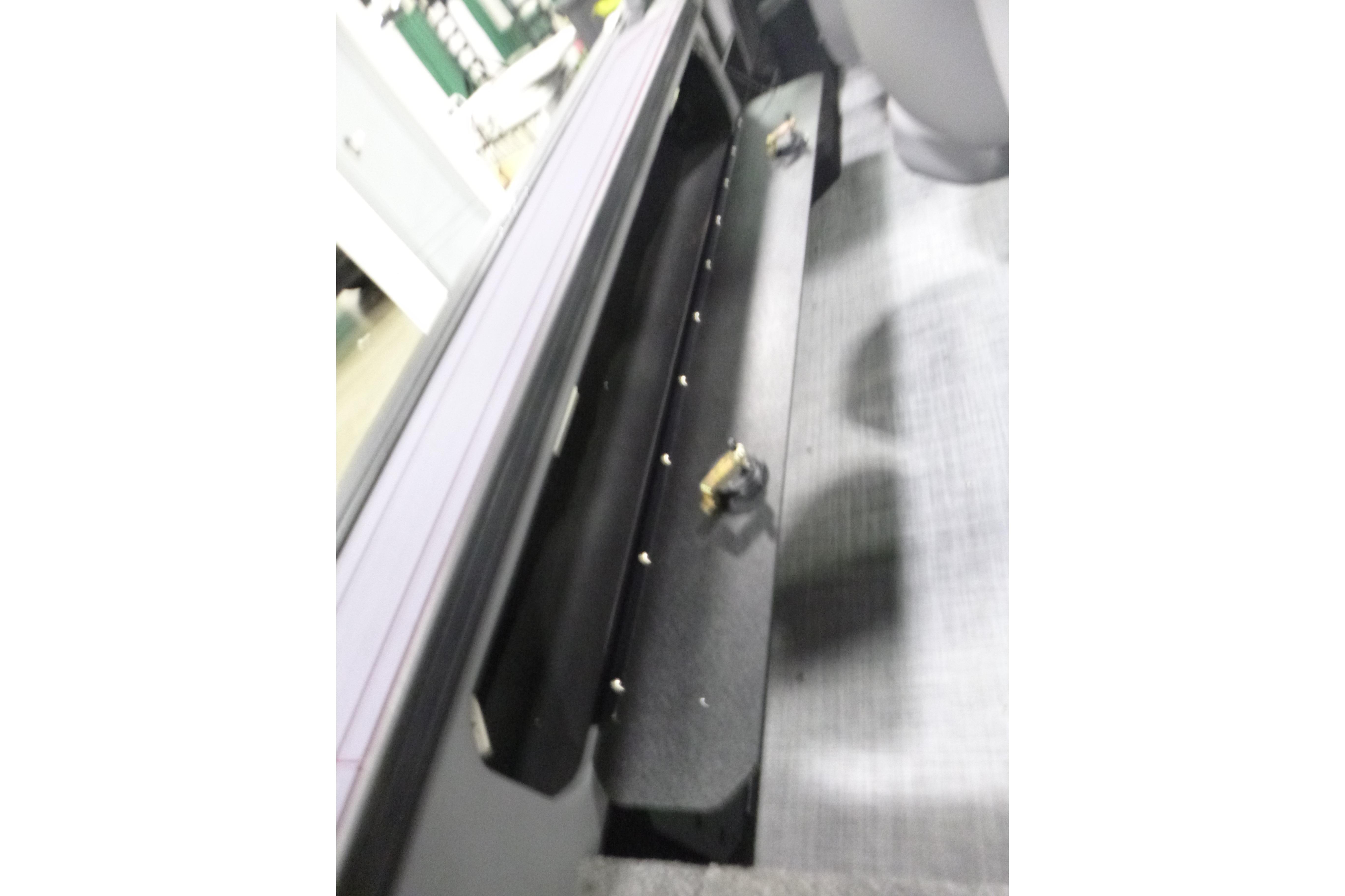 2026 Alumacraft Trophy 205X Sport interior storage compartment detail.