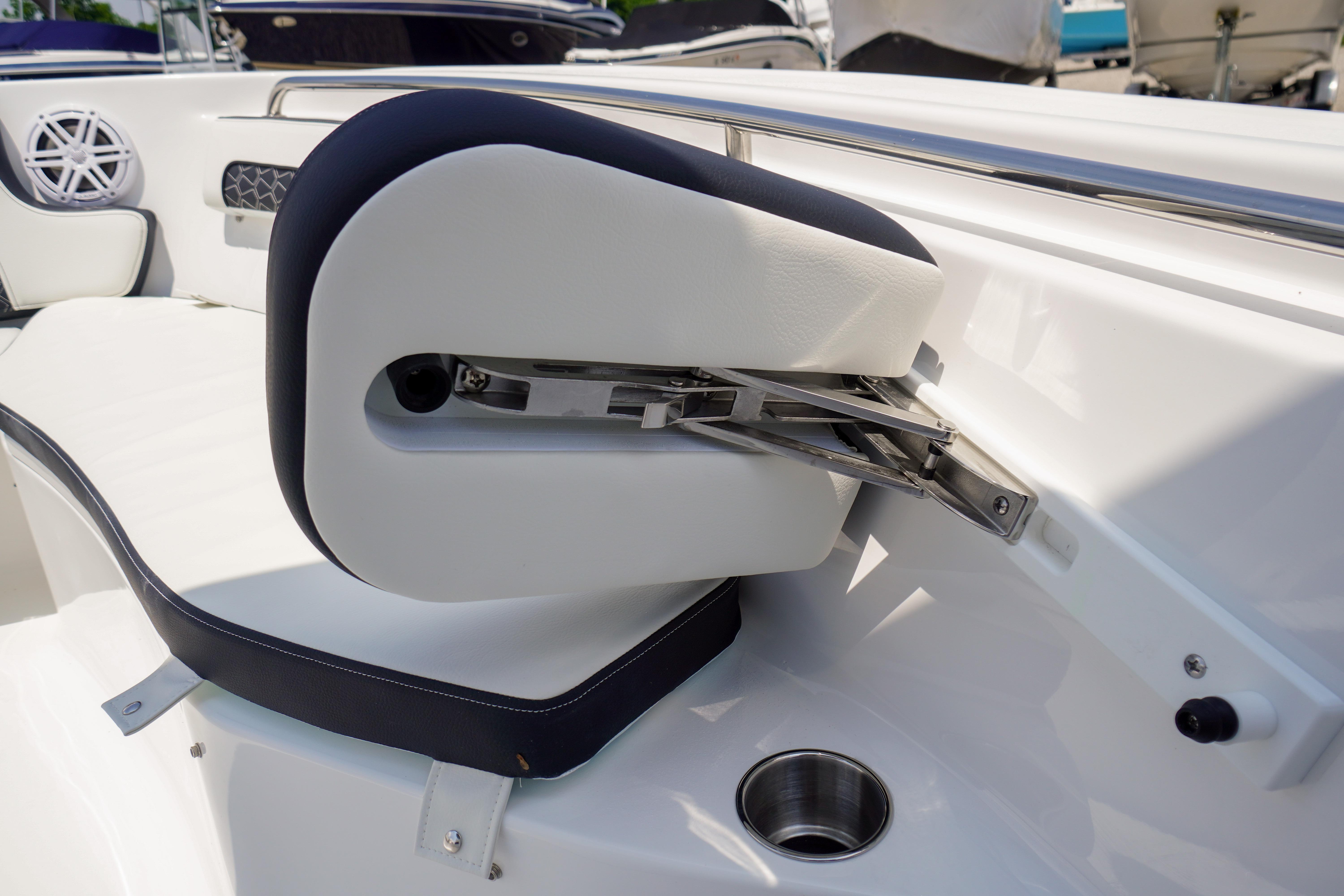 2027 Tidewater 220 CC Adventure boat seat detail with stainless steel hardware.