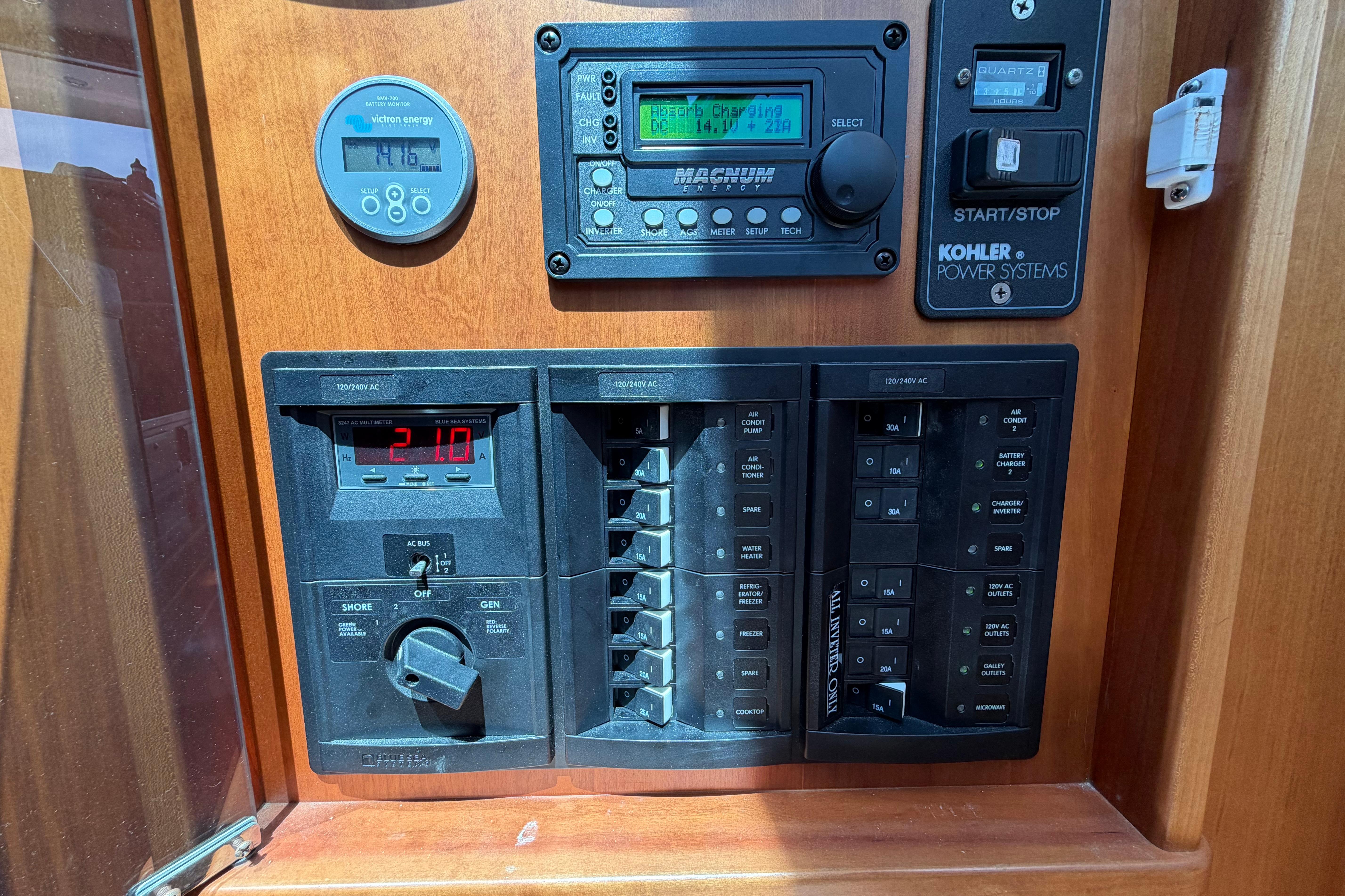 Control panel of a 2015 Sabre 38 Salon Express yacht with various gauges and switches.