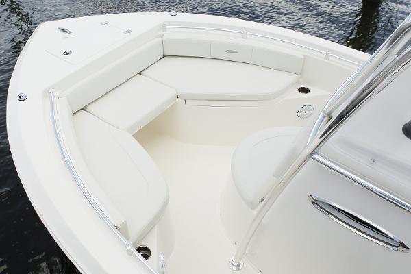 Manufacturer Provided Image: 2018 Cobia 201 Center Console boat with white cushioned seating area.