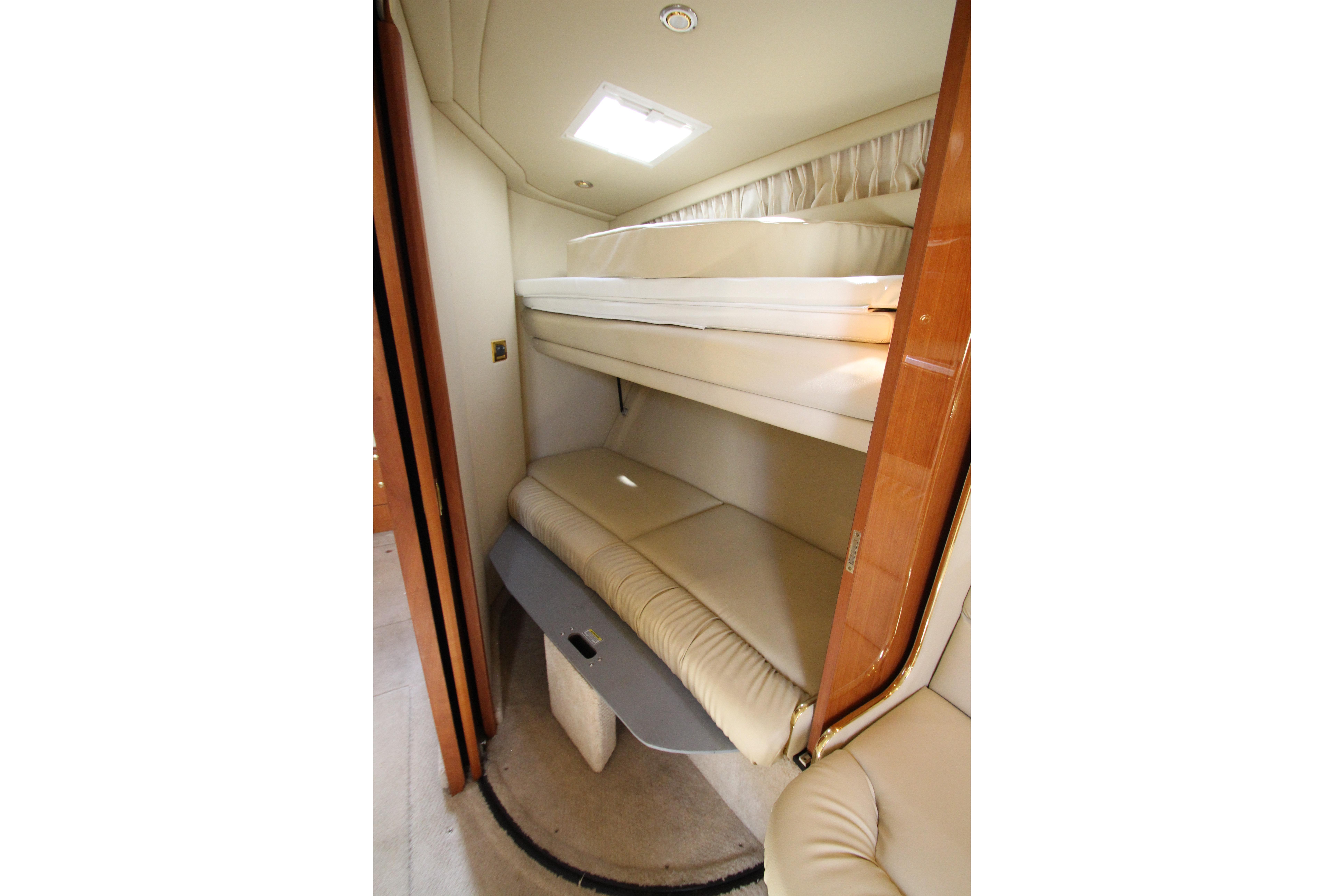 Interior cabin of 2000 Sea Ray 410 Express Cruiser with bunk beds.