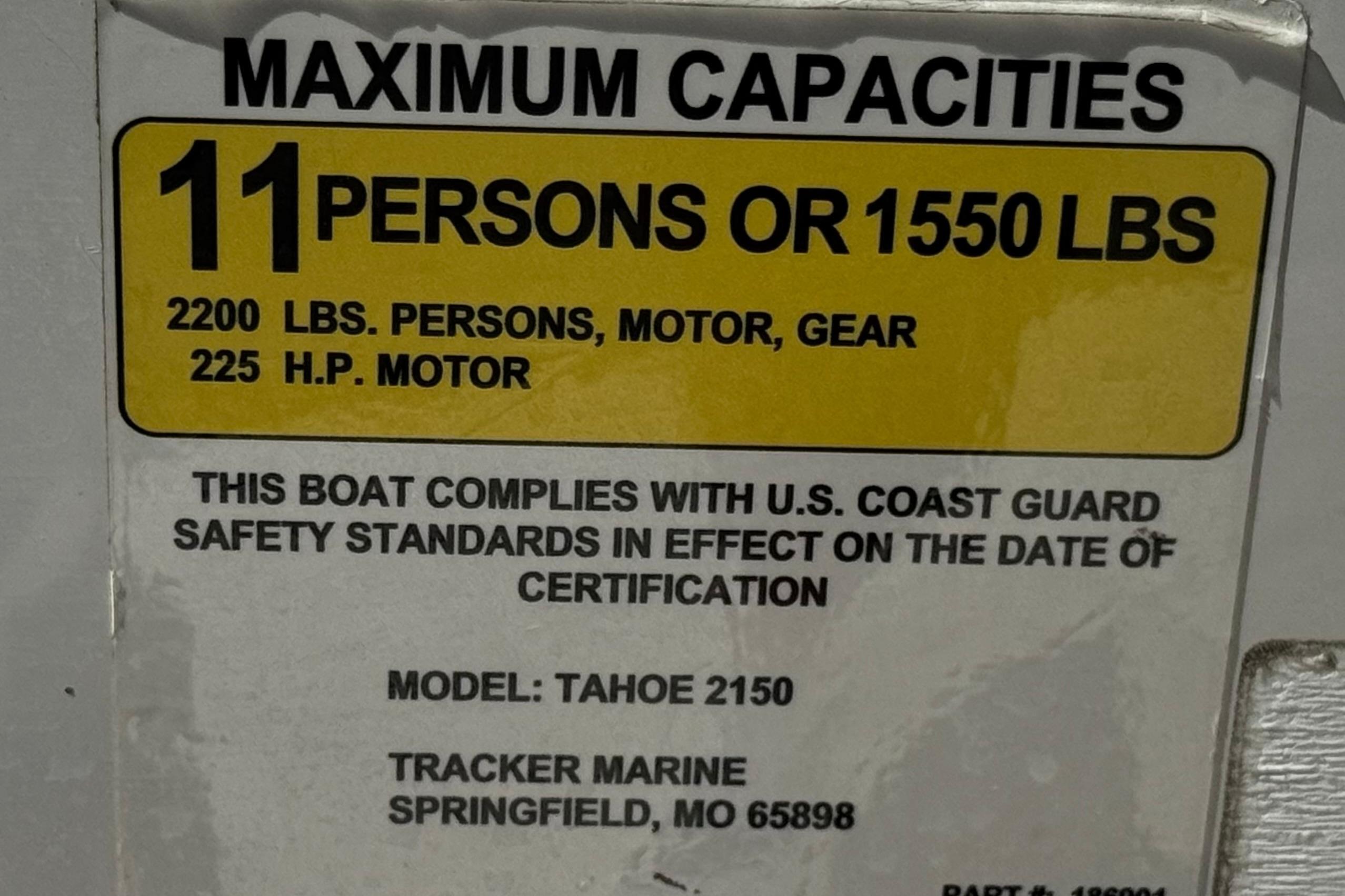 2017 Tahoe 2150 boat capacity label: 11 persons or 1550 lbs, 225 HP motor.