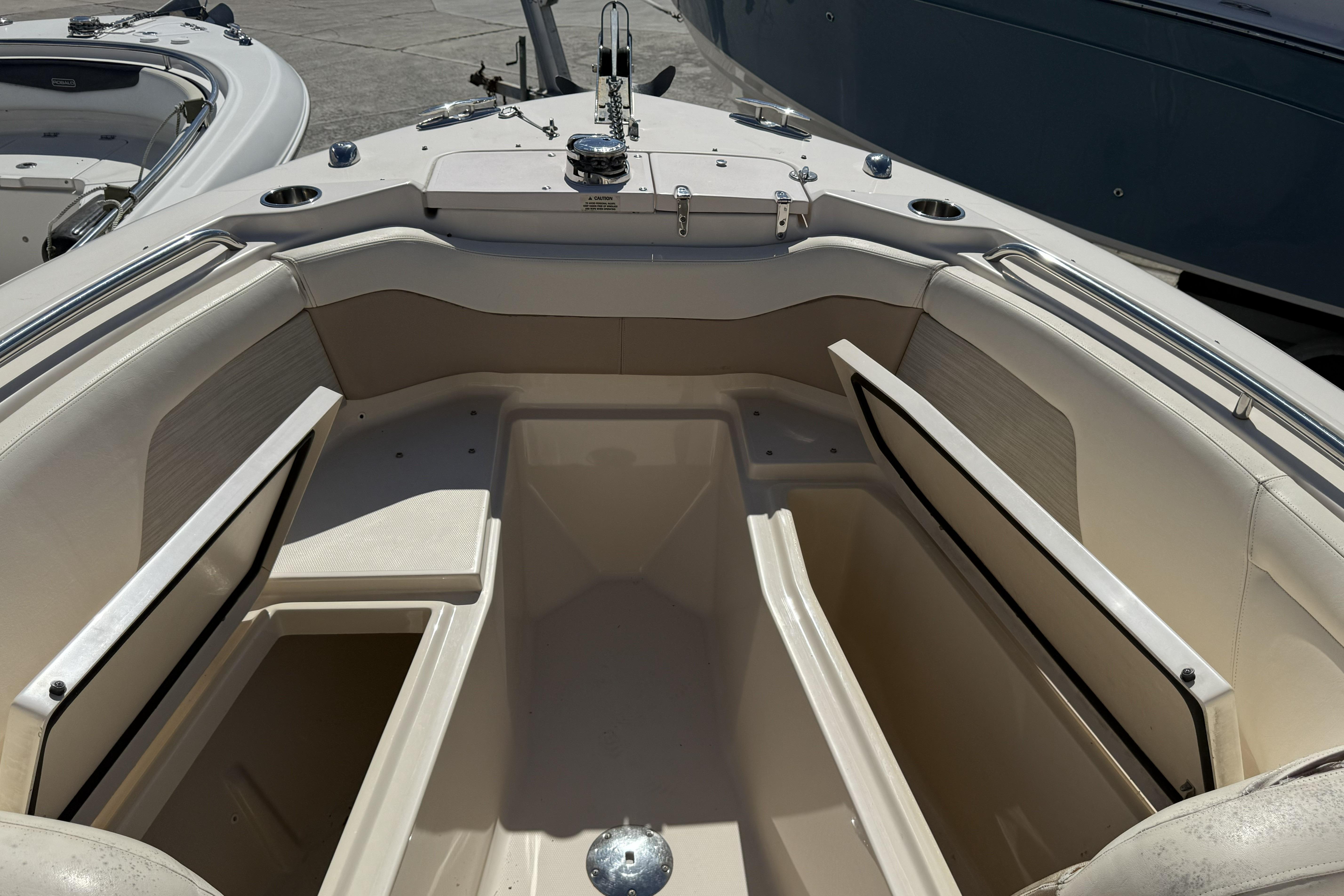 2014 Grady-White Freedom 275 boat interior with seating and storage compartments.