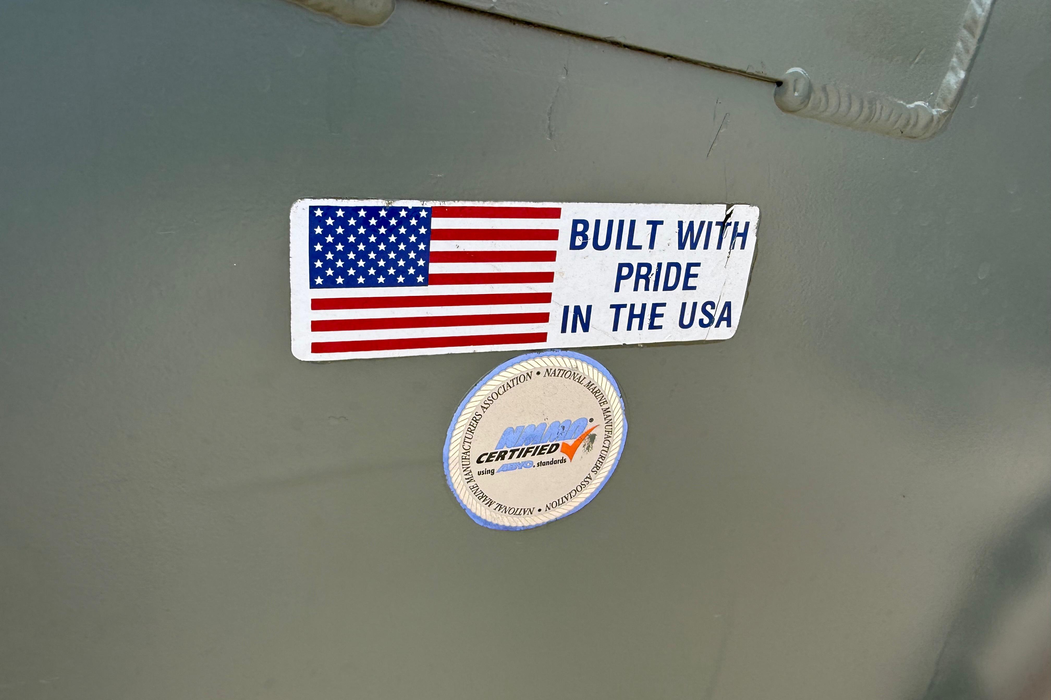 "Built with pride in the USA" sticker on 2020 Lowe Roughneck 2070 Big River boat.