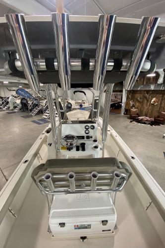 2024 Key West 250 Bay Reef center console boat interior with rod holders.