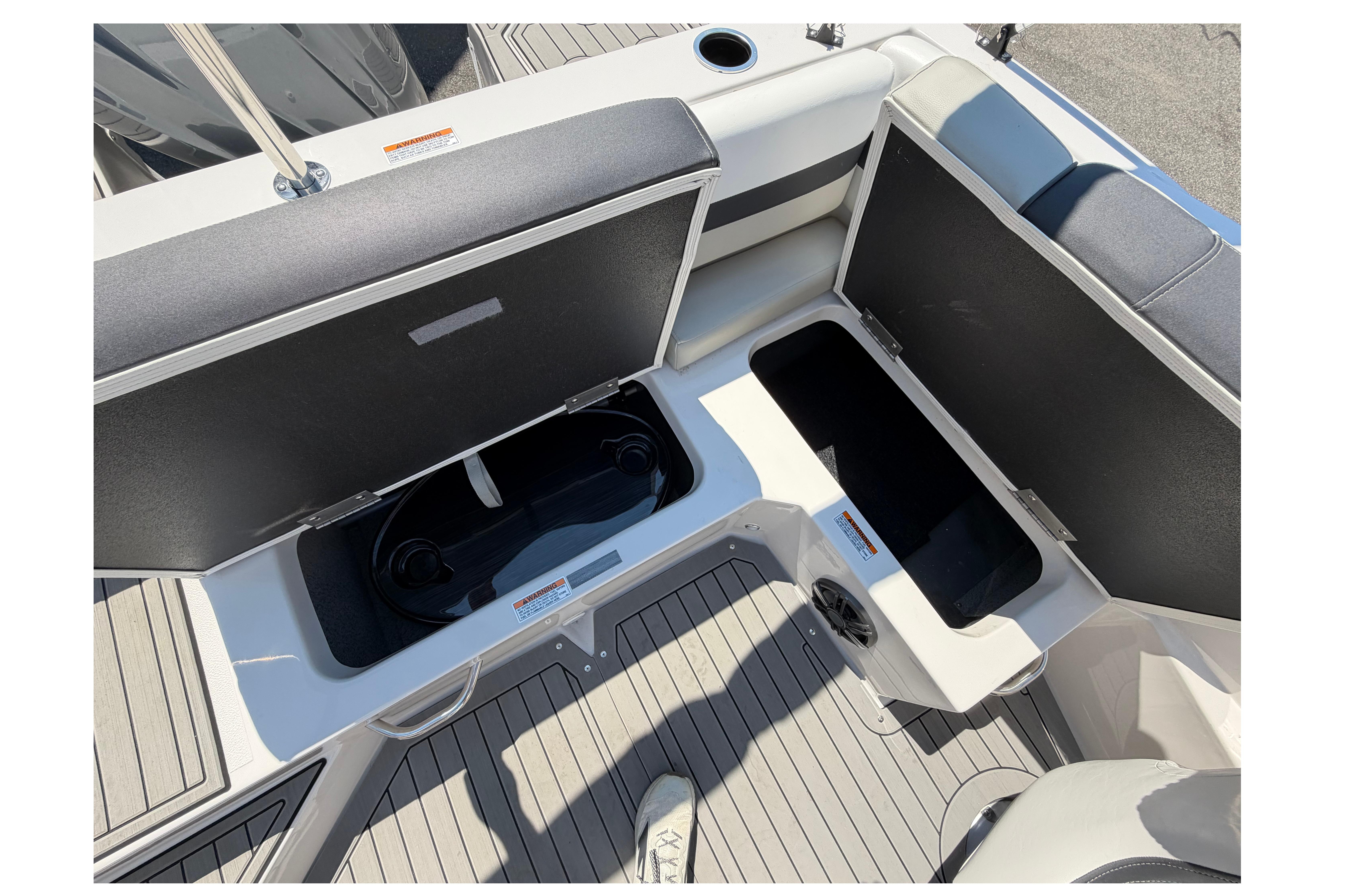 2025 Starcraft SVX 190 OB boat interior storage compartments and seating area.