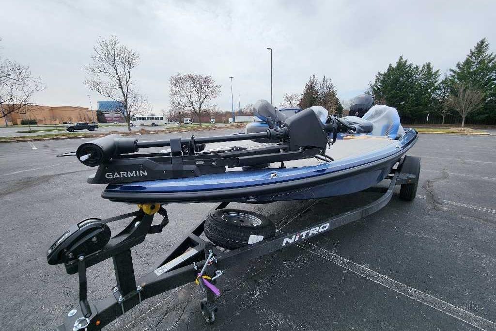 2026 Nitro Z18 Pro boat with Garmin equipment on trailer in parking lot.