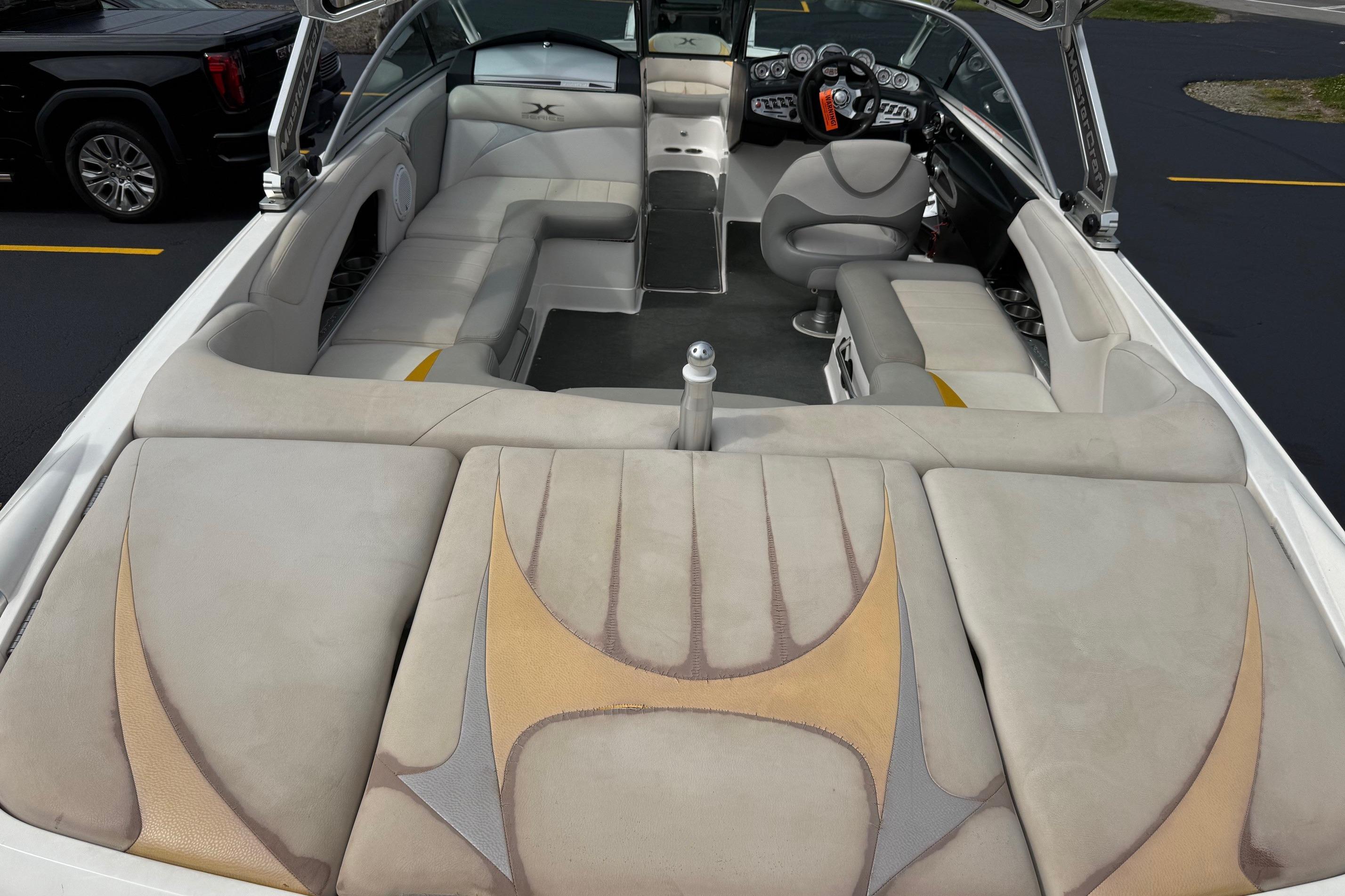 2008 MasterCraft X-15 boat interior with spacious seating and modern dashboard design.