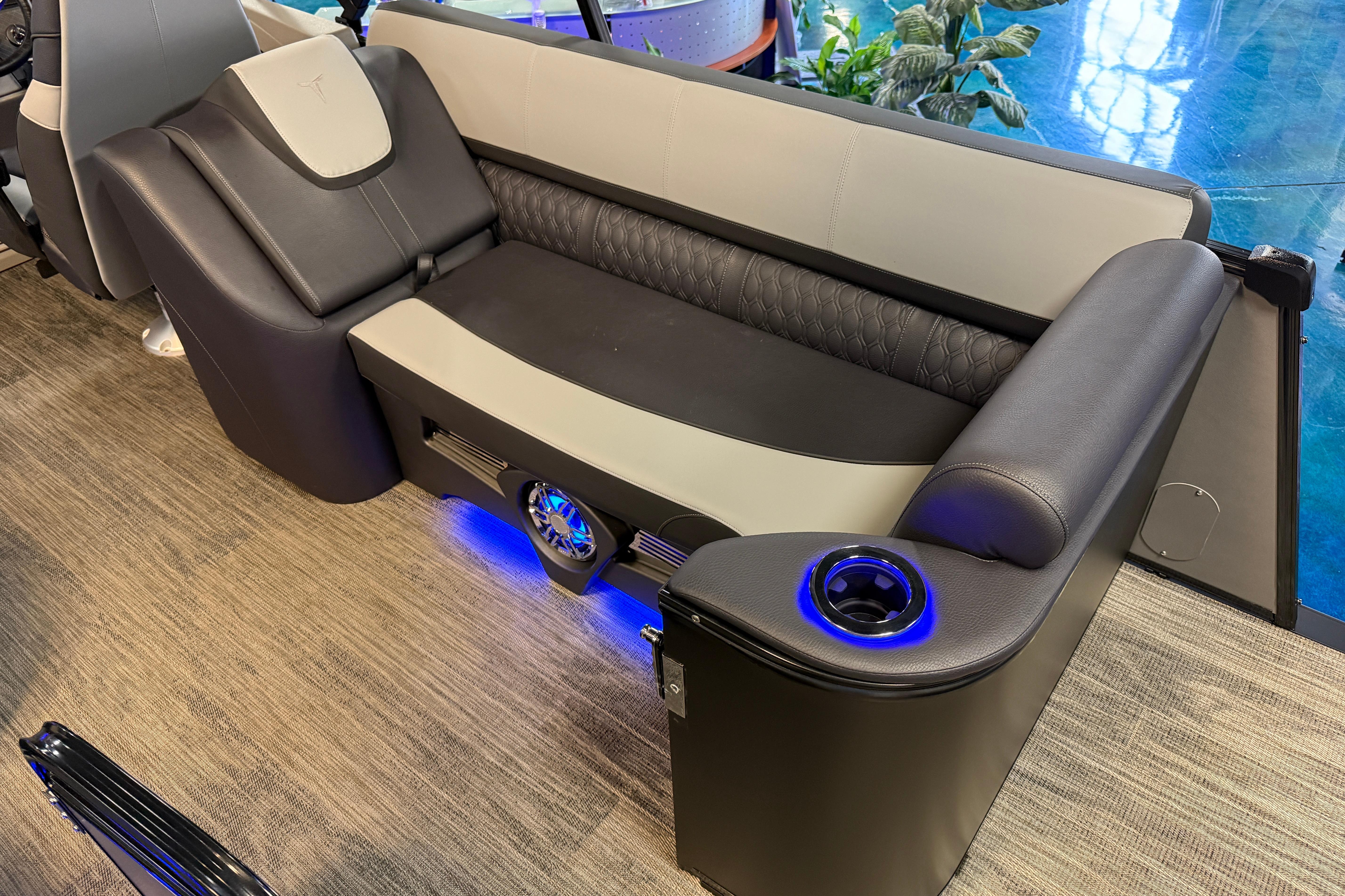 Luxurious seating on 2026 Tahoe Pontoon Cascade Cruise Rear Bench with blue LED lighting.