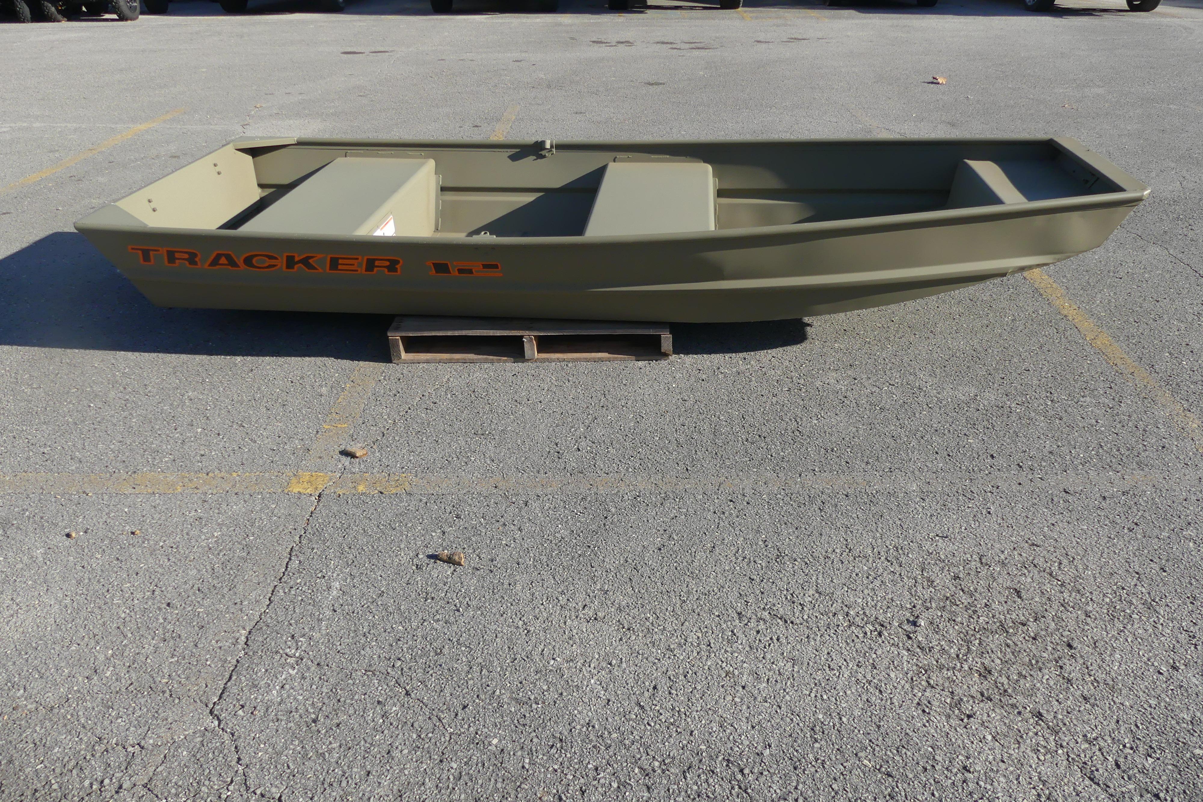 2026 Tracker Grizzly 12 Jon boat on pavement, showcasing its sturdy design.