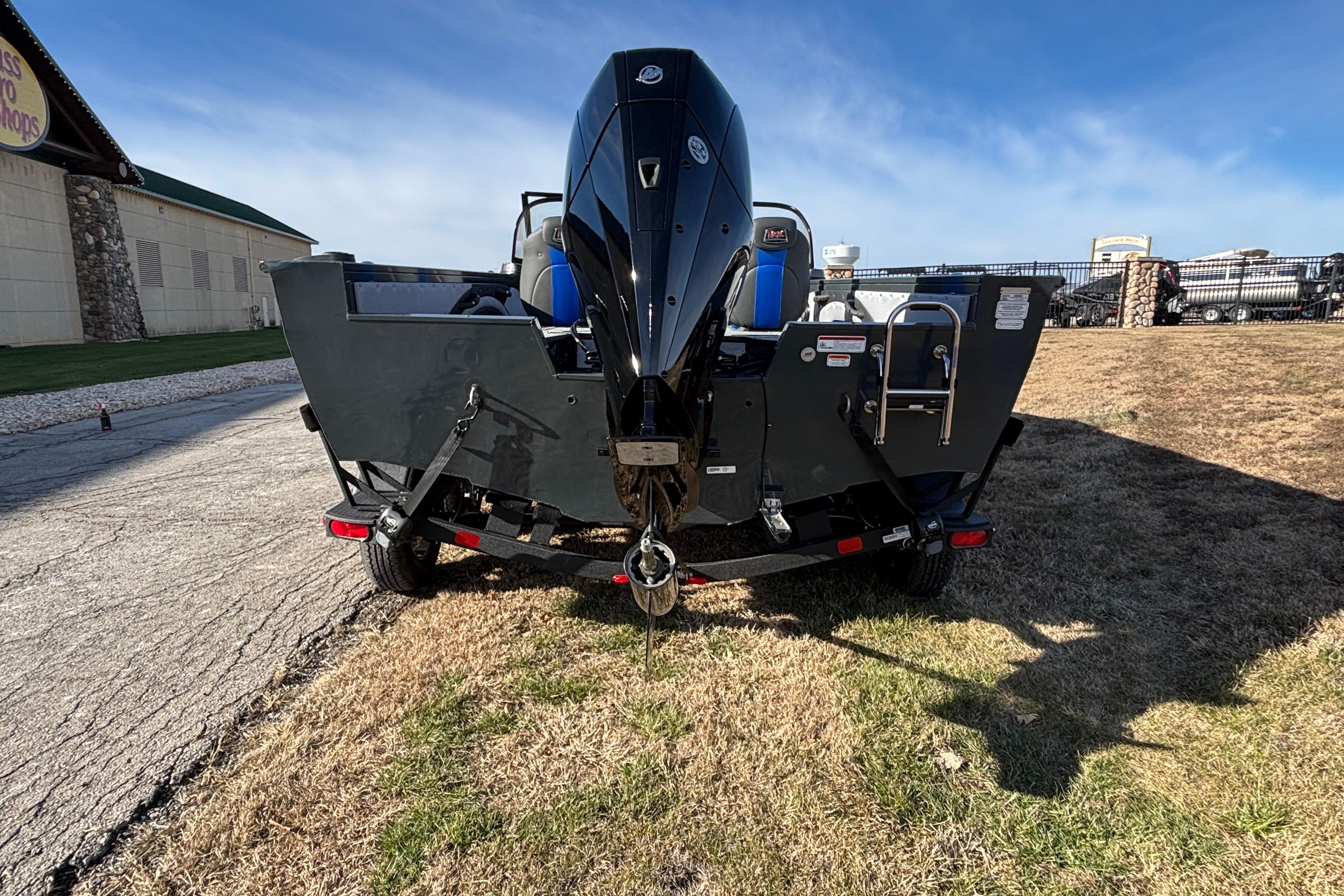 2026 Ranger VX1888 WT boat on trailer, rear view, outdoors on grass.