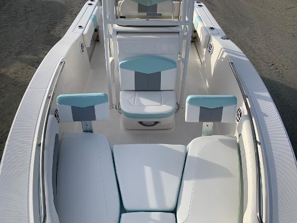 2024 Robalo R202 Explorer boat interior with white and teal seating.