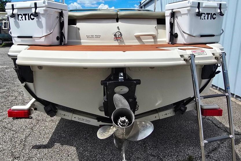 Rear view of a 2006 Sea Ray 185 Sport boat with RTIC coolers.