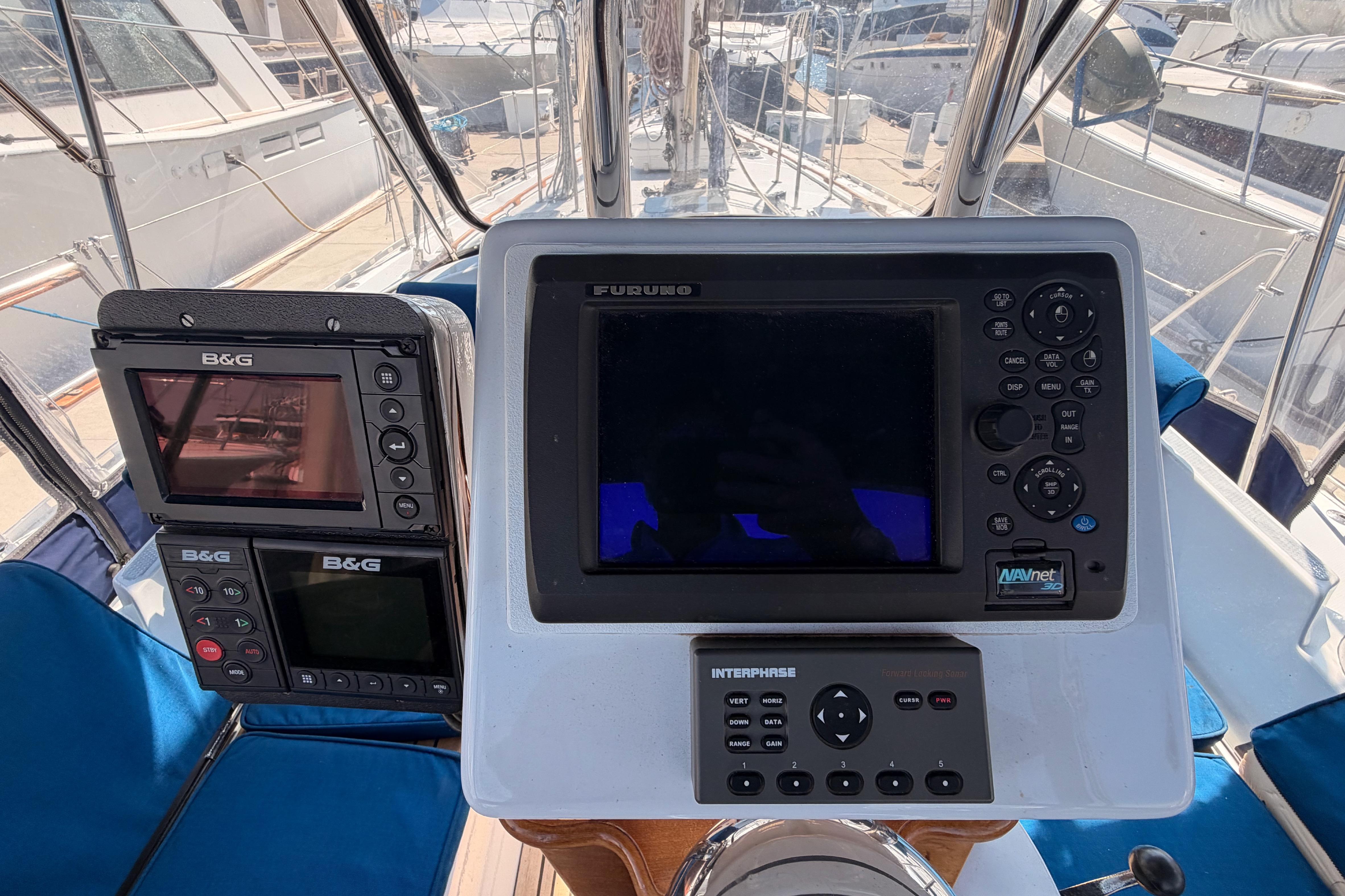Cockpit navigation equipment on a 1991 Hylas 51 yacht, featuring B&G and Furuno displays.