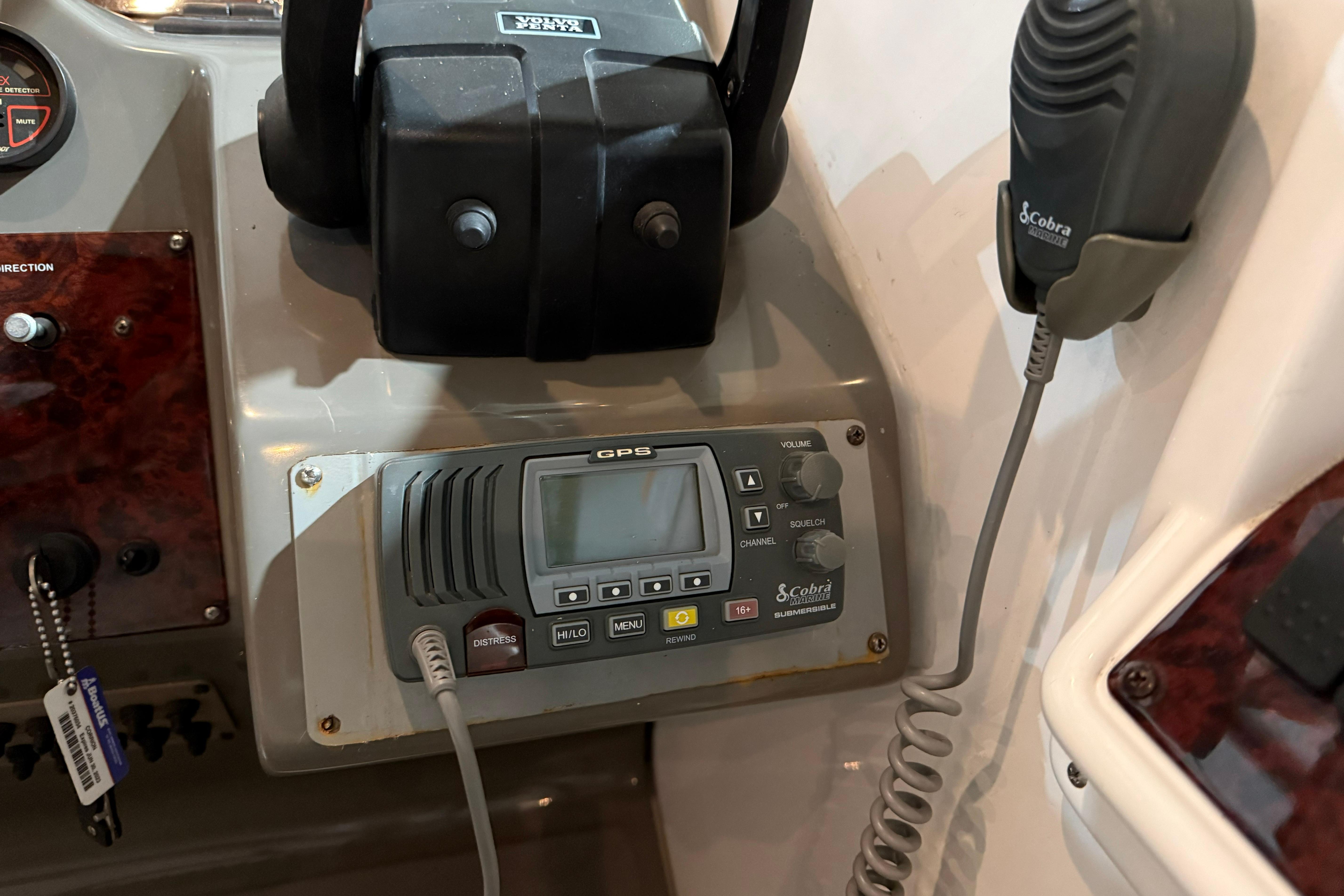 2007 Regal Commodore 3760 IO boat dashboard with Cobra GPS and radio system.