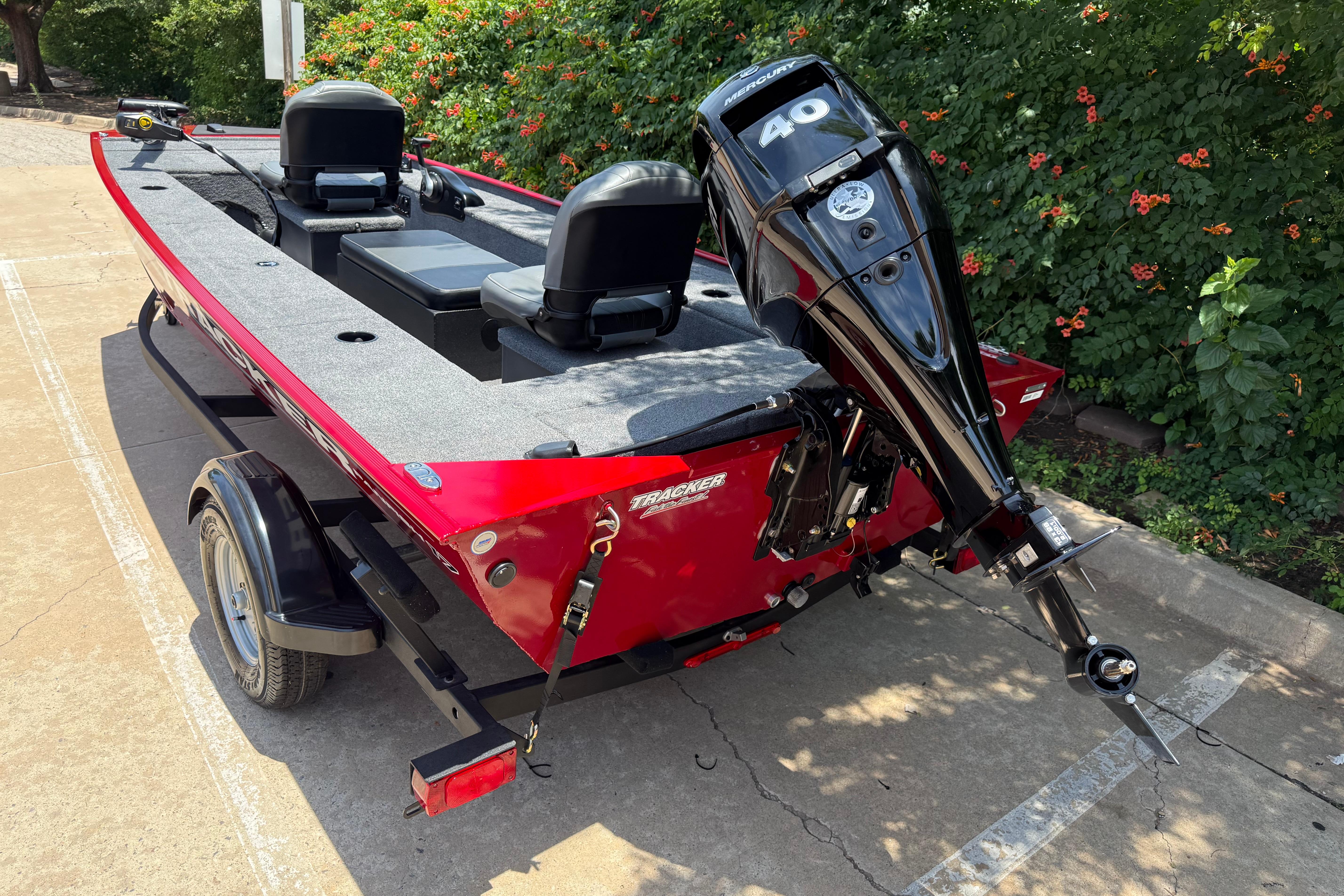 2025 Tracker Panfish 17 boat with Mercury 40 engine, parked on a trailer.