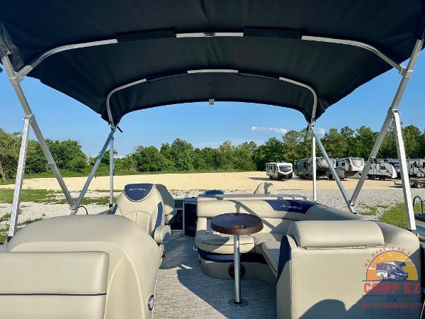 2025 South Bay 224FCR LE pontoon boat interior with canopy and seating.