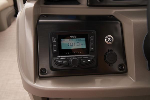 2024 Sun Tracker SportFish 22 DLX boat dashboard with stereo system.