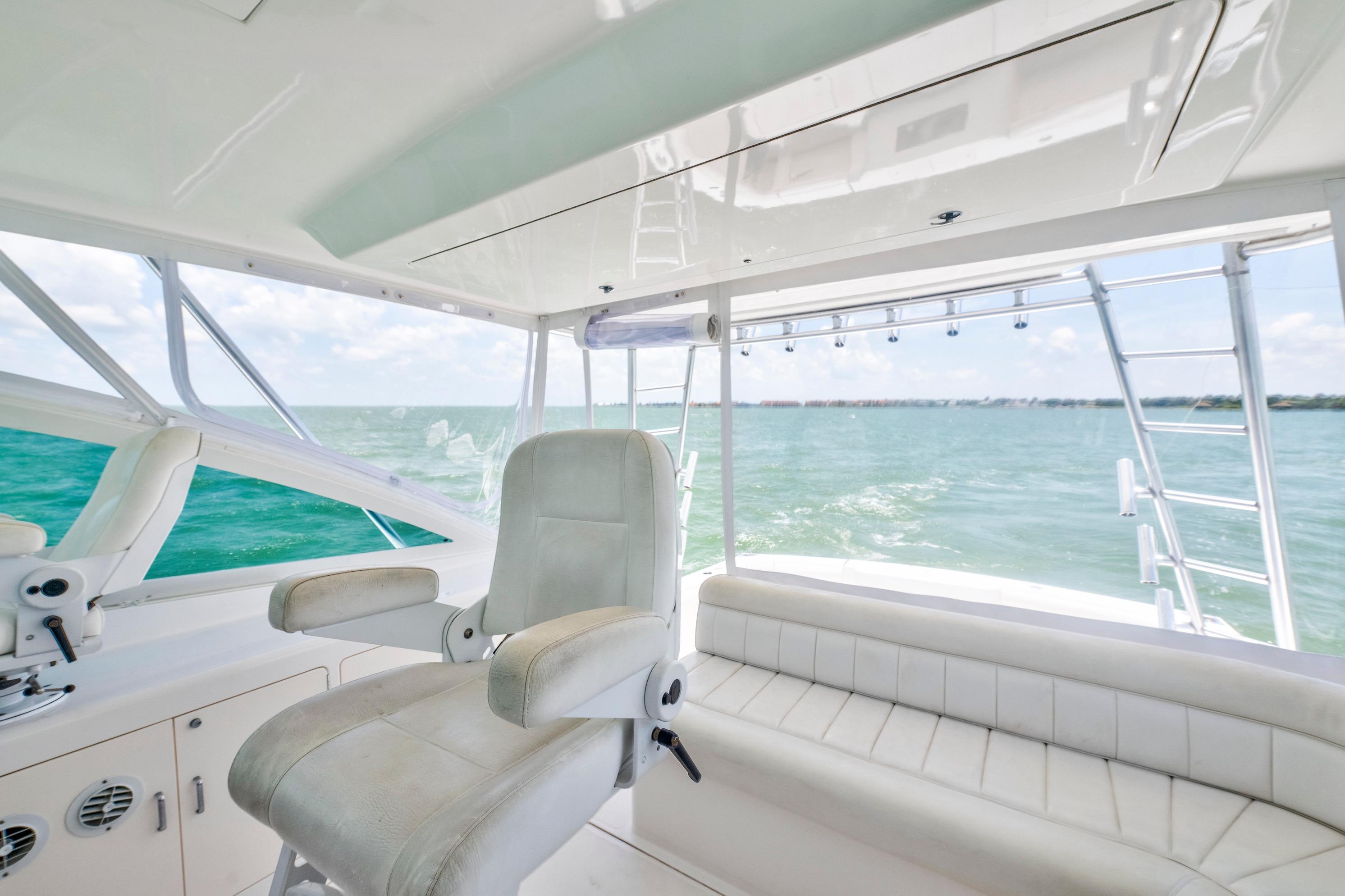 Interior view of 2010 Cabo 45 Express yacht with ocean backdrop.