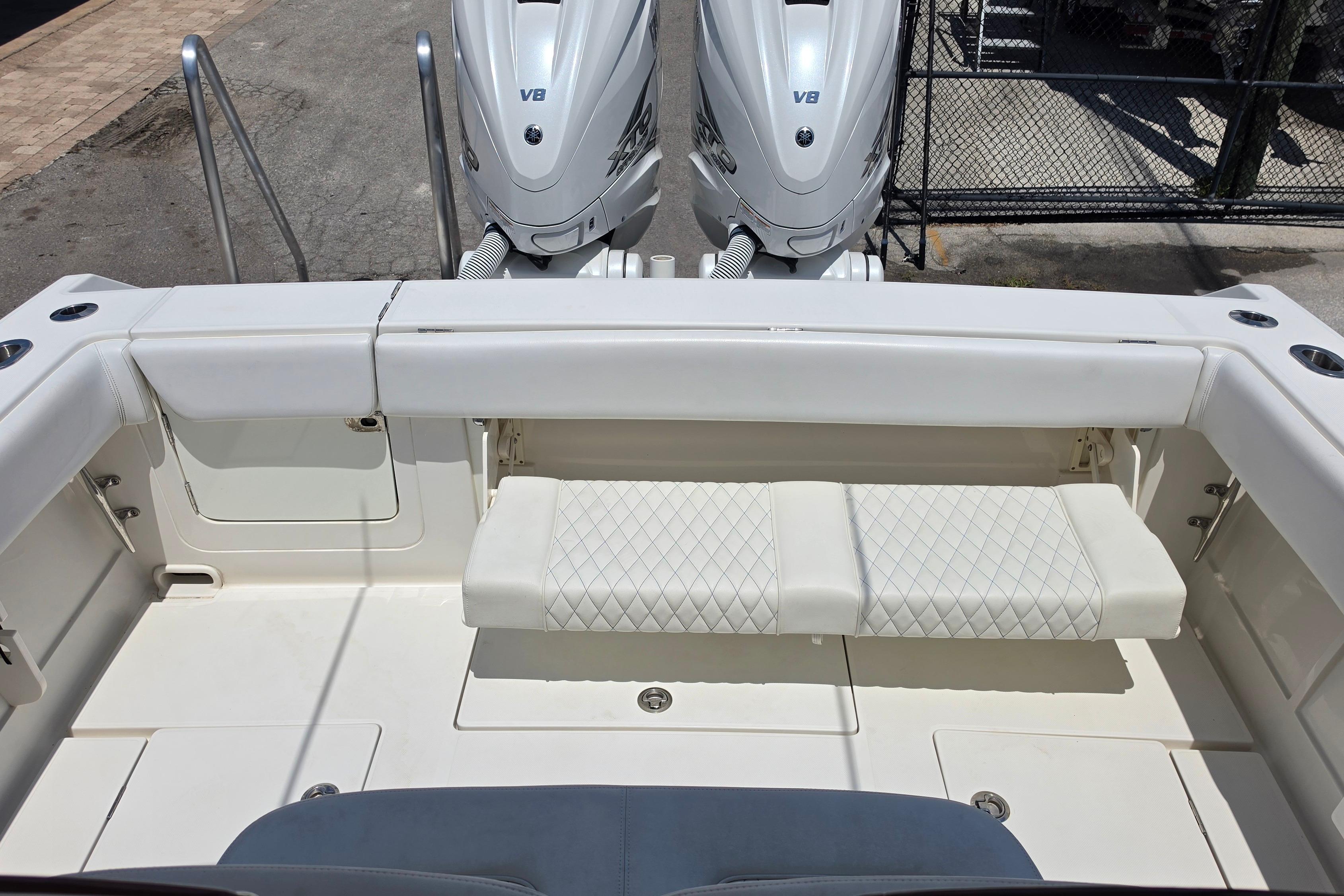 2020 Jupiter 34 HFS boat with dual V8 engines and cushioned seating.