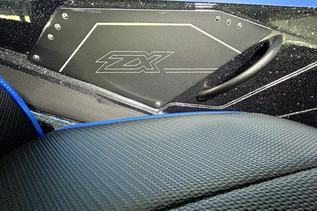 2026 Skeeter ZX200 interior detail with textured seat and ZX logo panel.