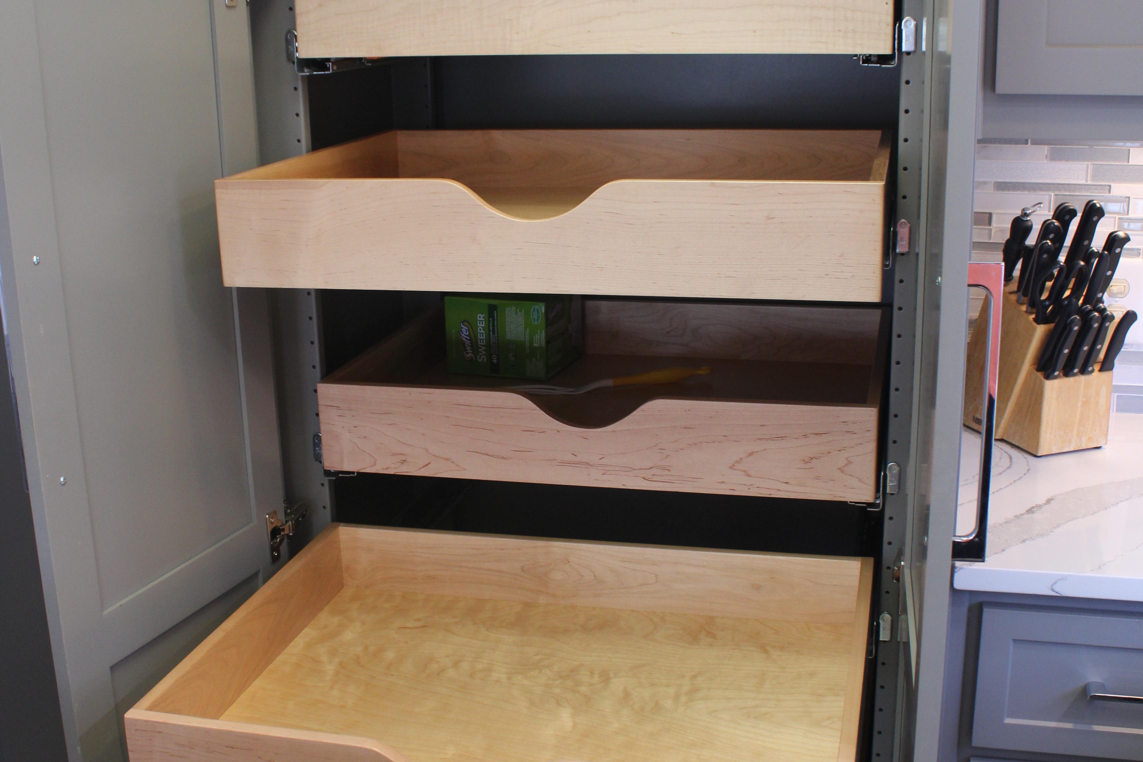 Wooden pull-out drawers in a modern kitchen cabinet, Sumerset 66, 1992 model.