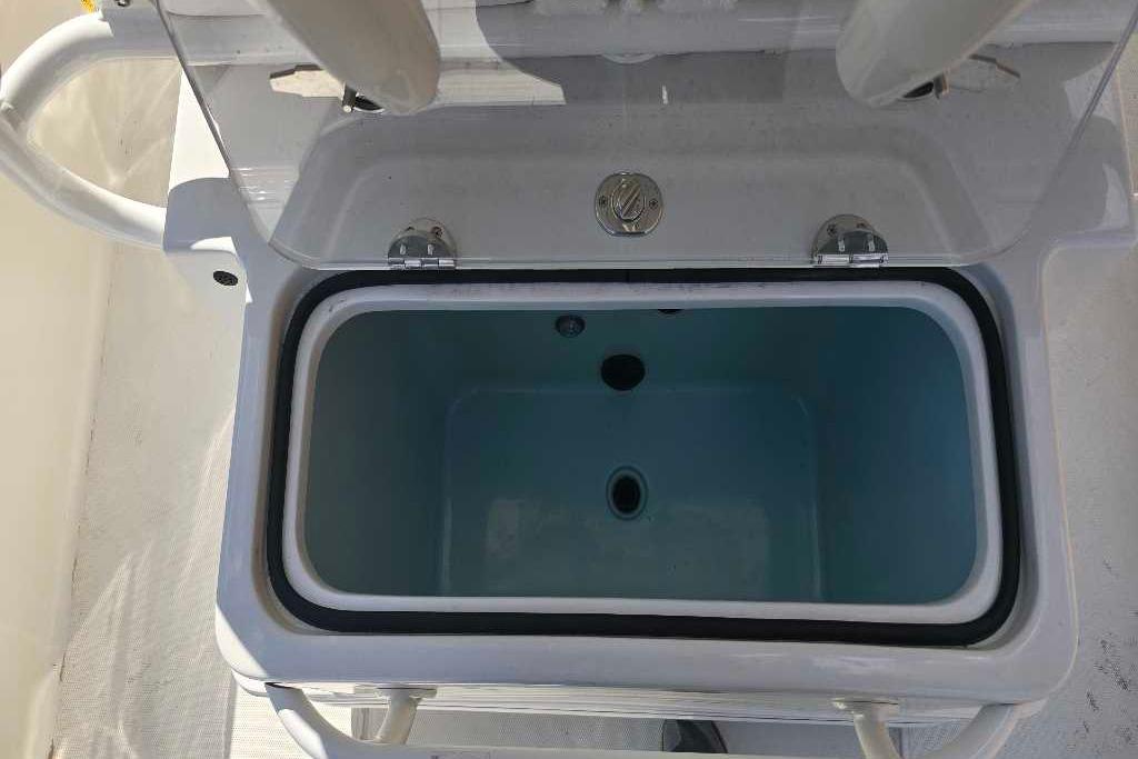 Open livewell on 2025 Ranger 2360 Bay boat, showcasing interior design.